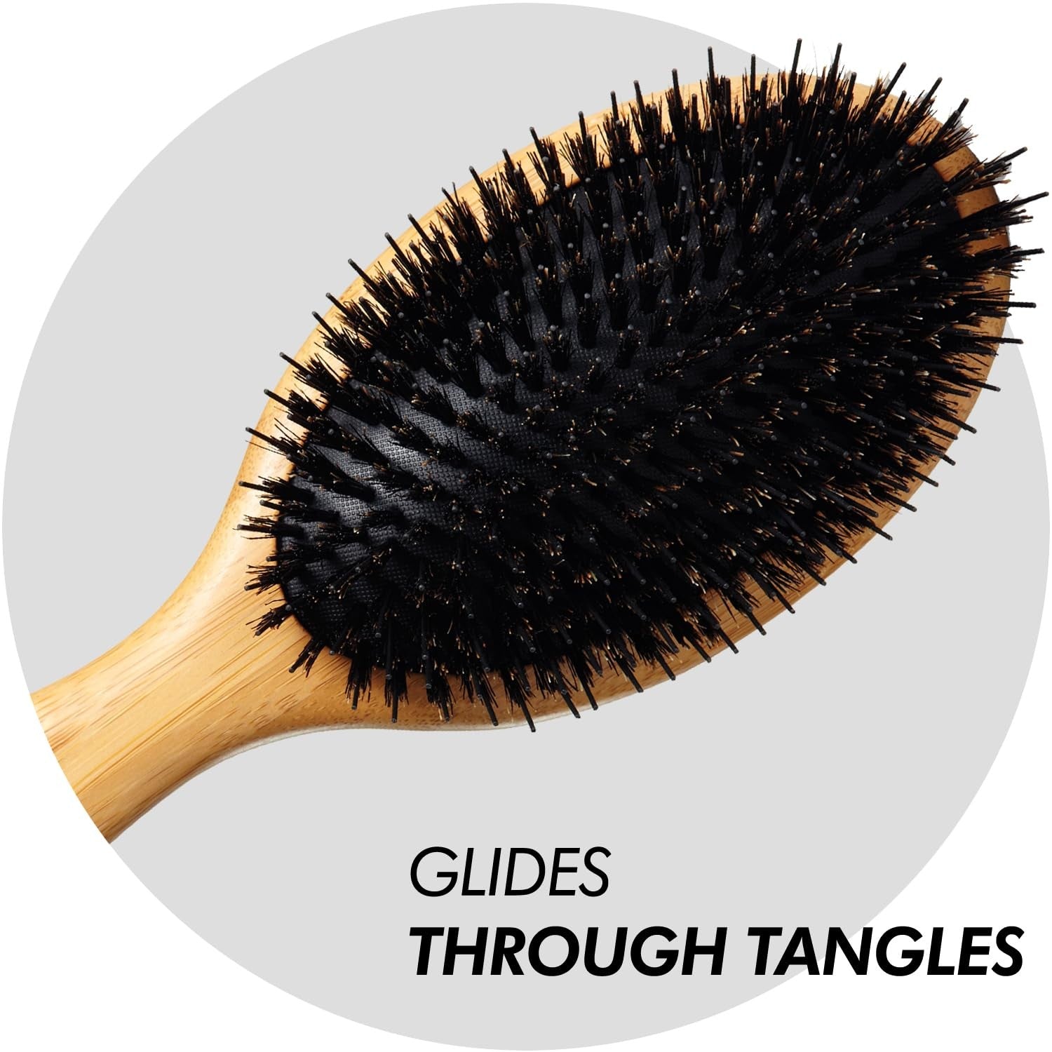 Sam Villa Signature Series boar bristle hair brush for styling, showing natural wood handle and dense bristles for smooth hair grooming.