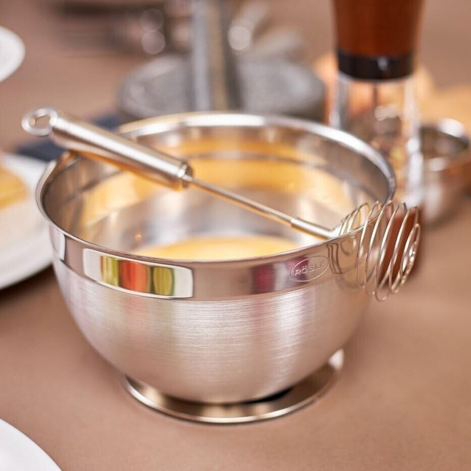 Rösle stainless steel 3-piece mixing, prep, and serving bowls set with 1.7-quart capacity, designed for versatile kitchen use.