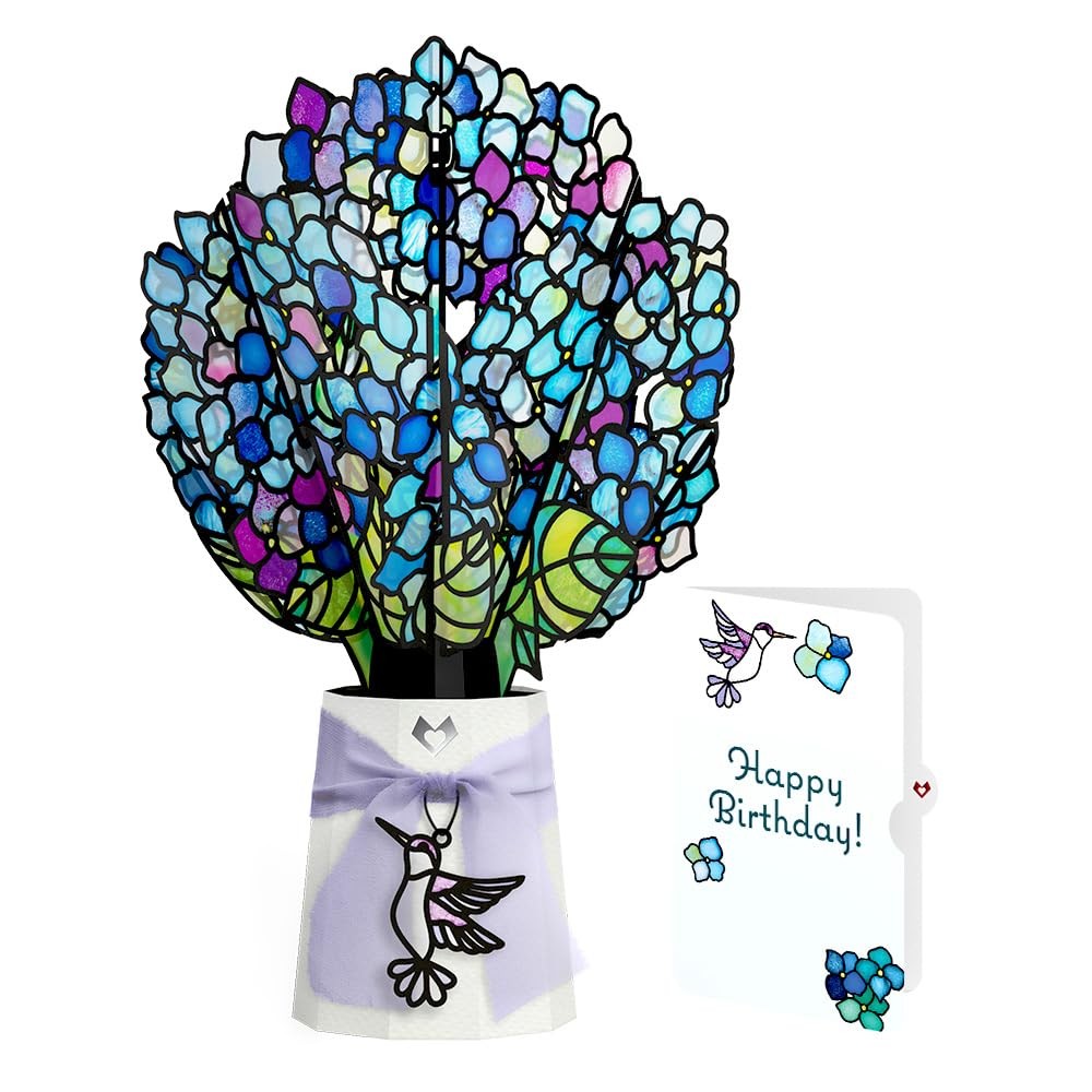 Lovepop birthday suncatcher bouquet featuring sunlit hydrangeas and birthday-themed floral designs with intricate paper craftsmanship.