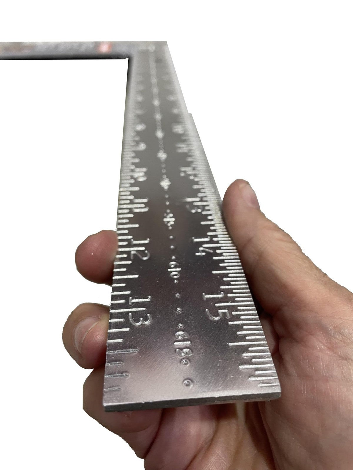Swanson aluminum carpenter square measuring 16x24 inches, with clear markings and sturdy construction for woodworking projects.