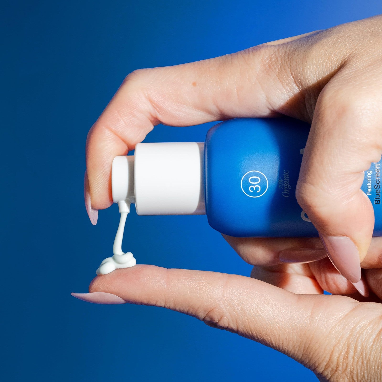 COOLA Refreshing Water Plumping Gel with SPF 30, dermatologist-tested facial sun protection, showing the gel in a clear container