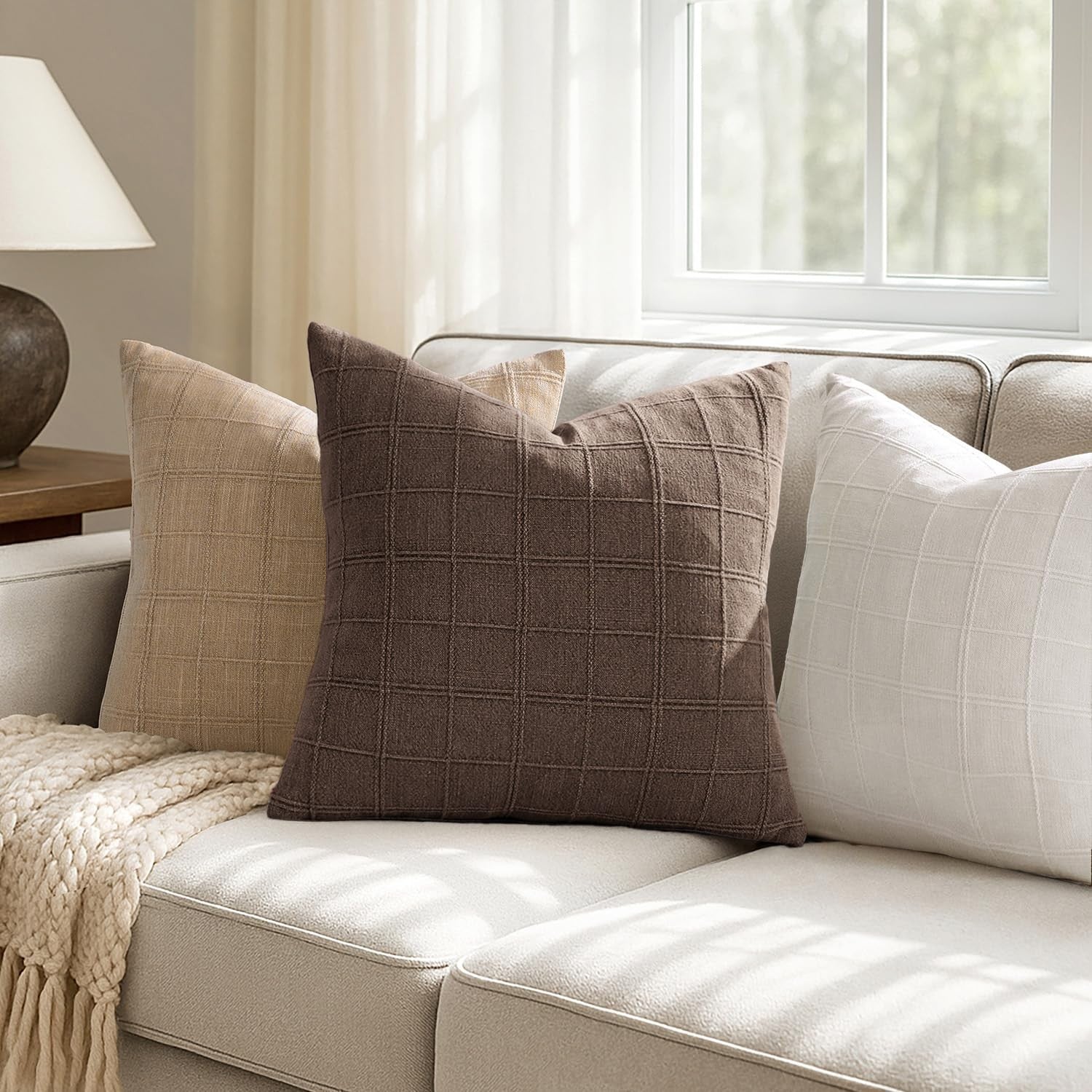 Woaboy linen check throw pillow cover in brown with farmhouse modern boho vintage style, 22x22 inches.
