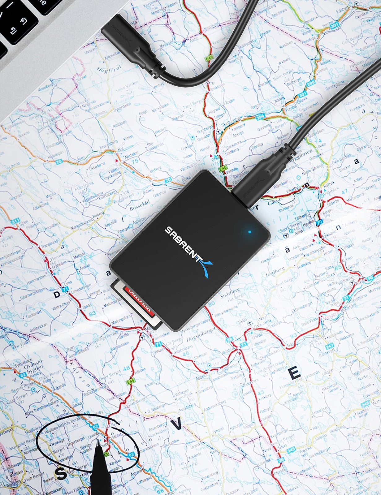 SABRENT CFexpress Type B card reader with USB 3.2, 10Gbps transfer speed, connected to a computer with a CFexpress card inserted.