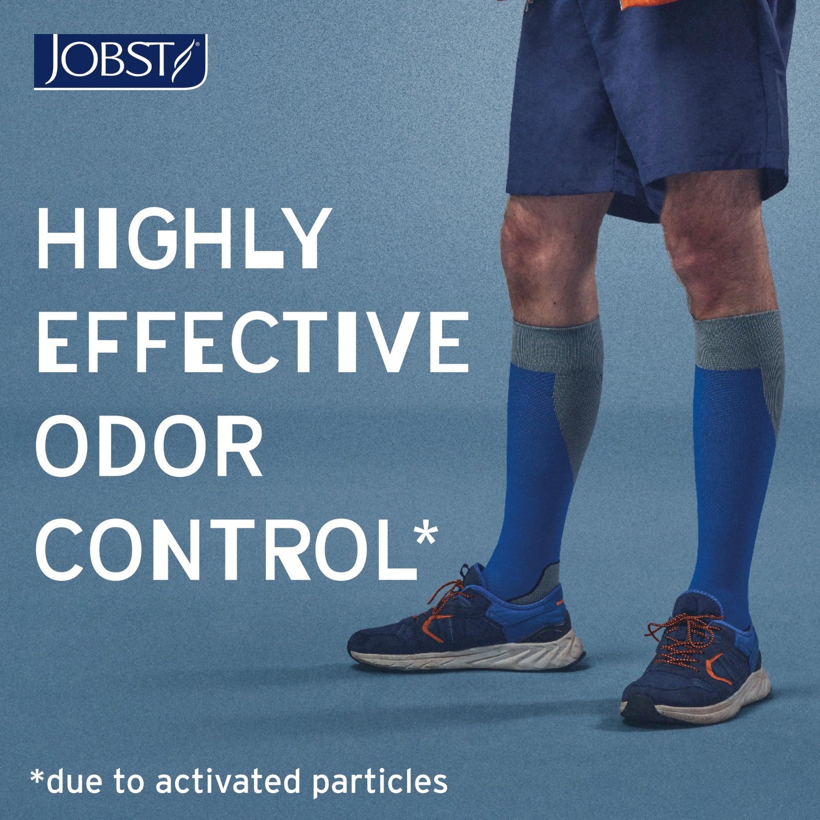 Jobst Sport knee-high compression socks in white and grey, X-Large, 15-20 mmHg pressure, designed for athletic support and circulation.