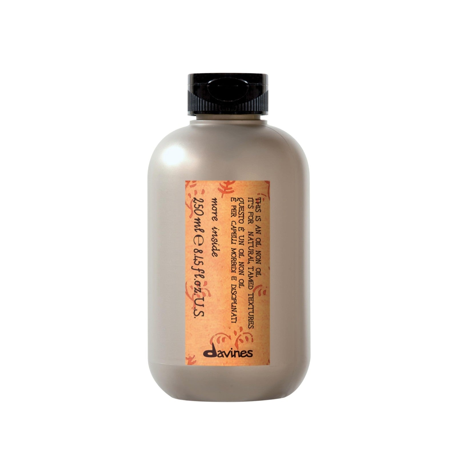 Davines This is an Oil Non Oil bottle with natural look and hydrated, smooth textured hair reflecting a shiny finish.
