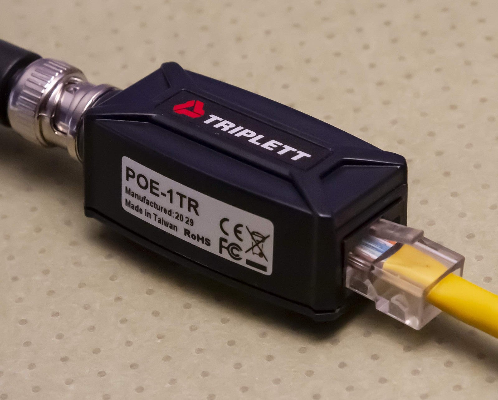 Triplett GEM IP Camera Signal Extender over coax cable, data-only, extending up to 984 feet, used for security camera systems.