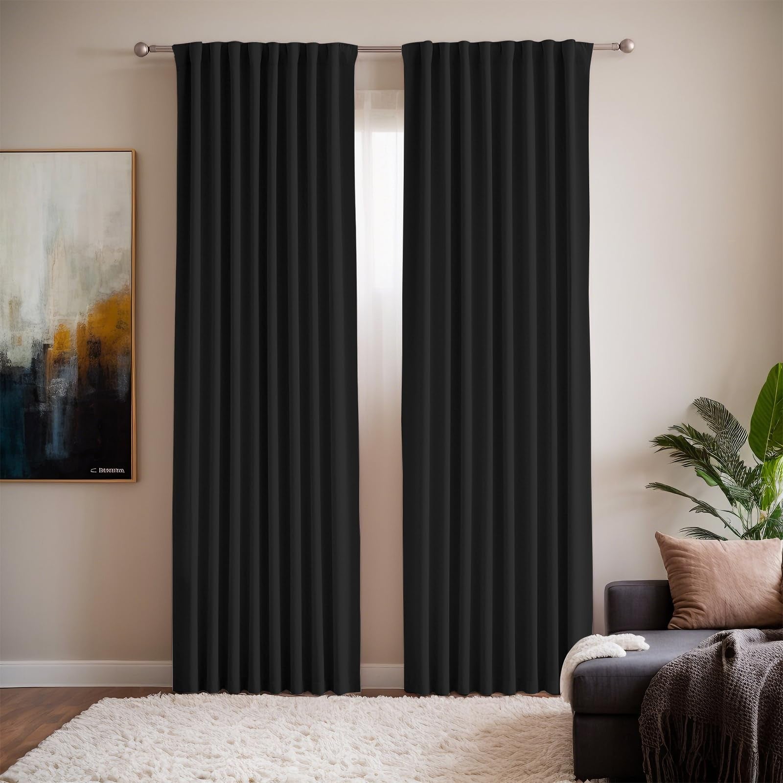 Black Grichril 108-inch blackout curtains with two panels, designed for bedroom window heat blocking and darkening.