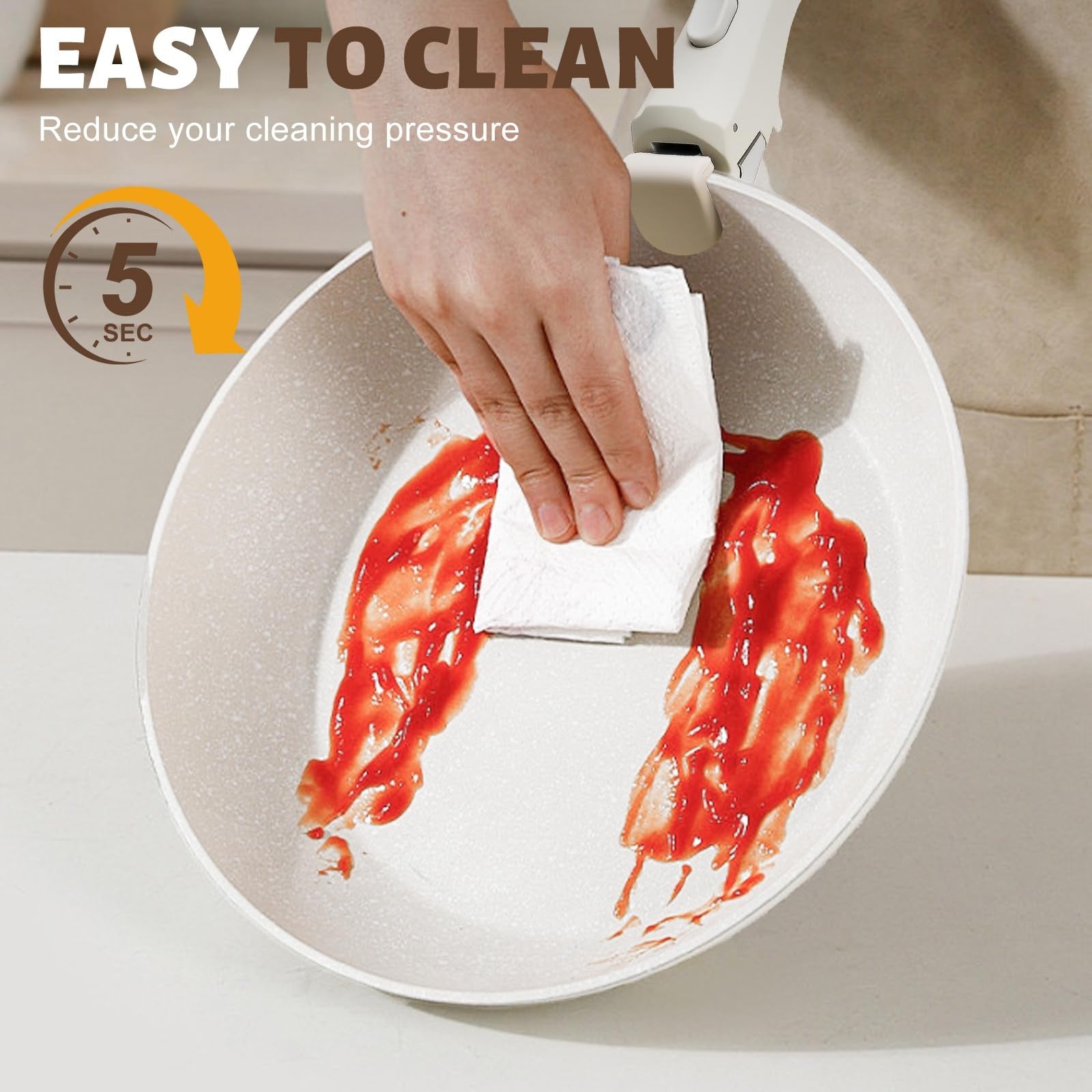 Numola 10-piece non-stick pots and pans set with detachable handle, ceramic cookware displayed on a kitchen countertop.