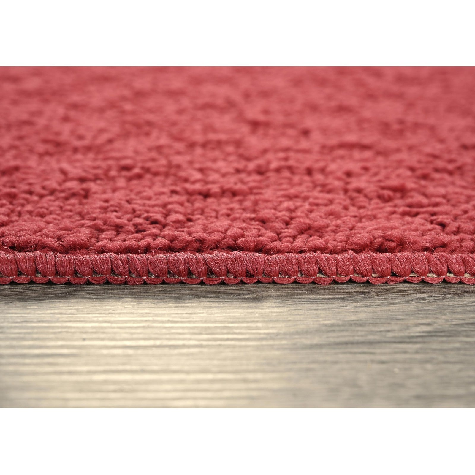 Garland Rug Town Square Chili Pepper Red round non-slip area rug with bold red chili pepper pattern for living room decor