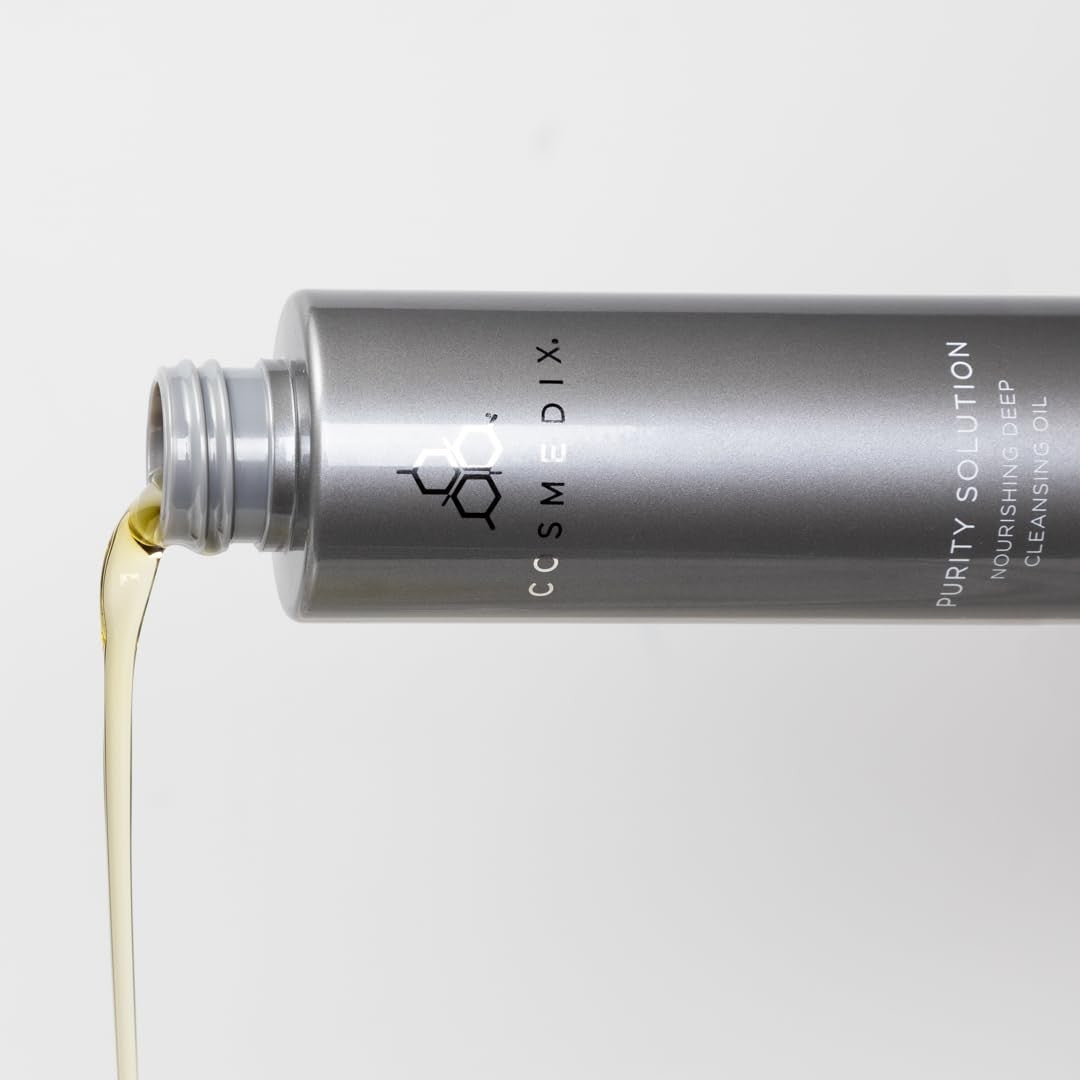 COSMEDIX Purity Solution Cleansing Oil showing a clear bottle with pump, designed for makeup removal and facial hydration.