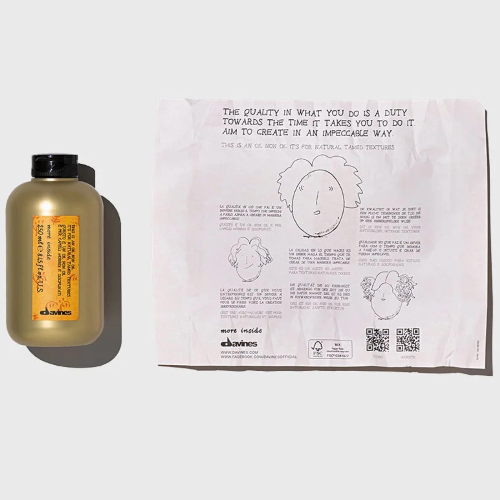 Davines This is an Oil Non Oil for natural, hydrated, and smooth textured hair, shown in a sleek black bottle with a pump.