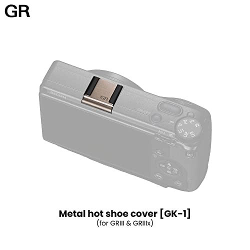 Ricoh GK-1 metal hot shoe cover attached to Ricoh GR III camera showcasing protective accessory on the camera's hot shoe area