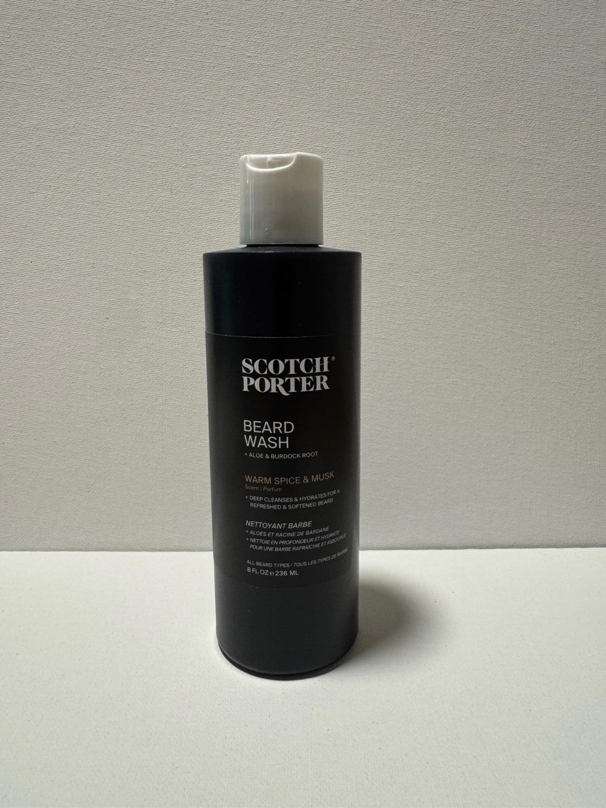 Beard wash bottle with label, moisturizing Scotch Porter beard wash for cleansing, refreshing, hydrating, and softening coarse dry beards.