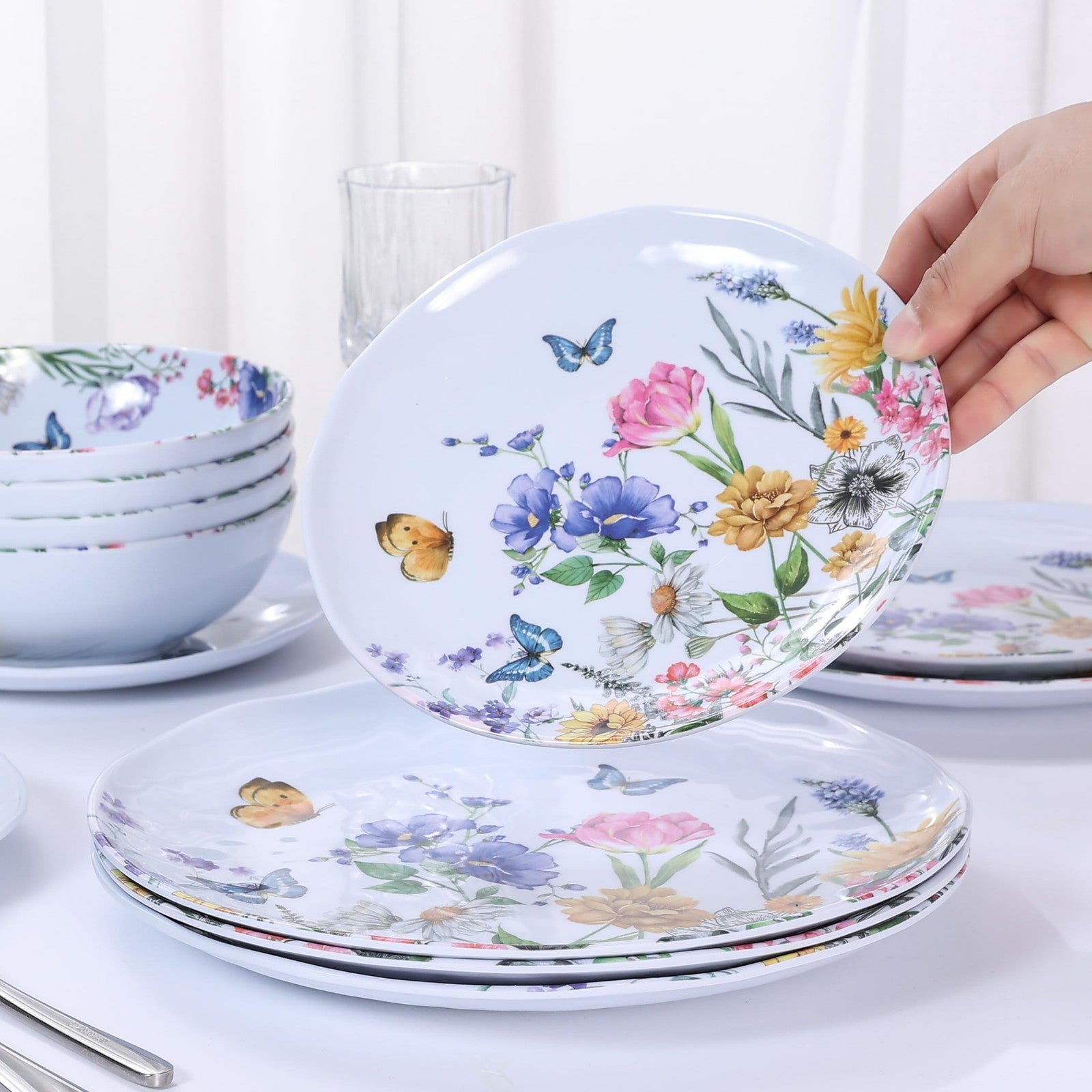 Lechoo 12-piece melamine dinnerware set featuring floral plates and bowls for four, perfect for casual dining.