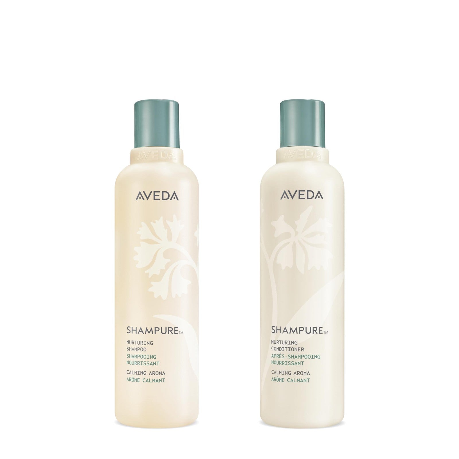 Aveda Shampure Nurturing Shampoo and Conditioner gift set with two bottles, featuring natural ingredients and calming labels.