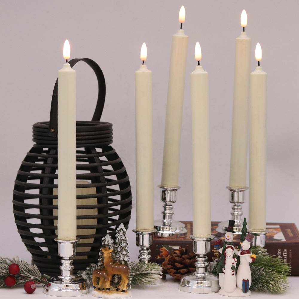 Wondise battery-operated window candles with 3D wick design, ivory taper style, remote control, and timer function displayed on a window.