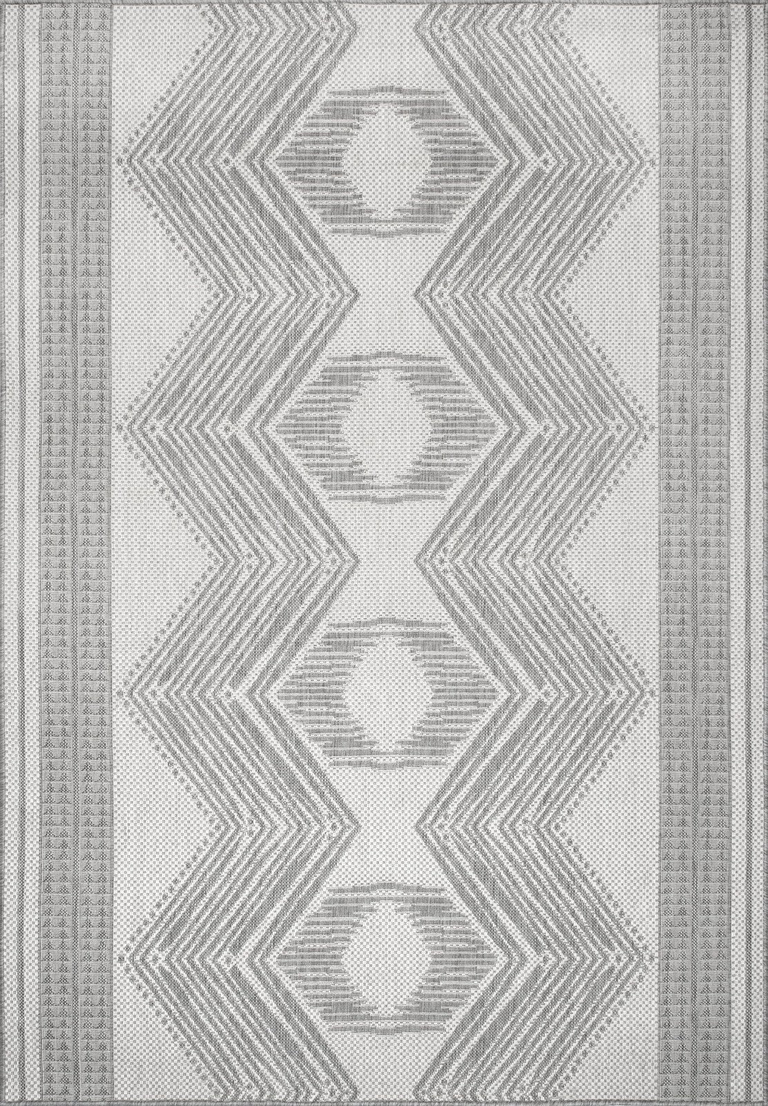 nuLOOM Ranya tribal geometric soft grey and ivory runner rug, 36x5 inches, with a cozy, plush texture and intricate pattern.