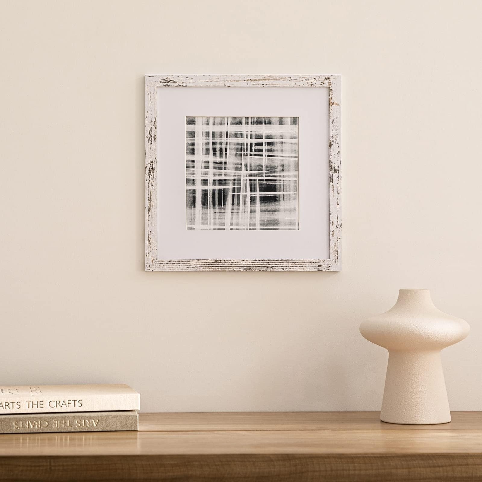 Eletecpro 12x12 picture frame set with nine frames, includes mats for 8x8 photos or frameless display, black border design