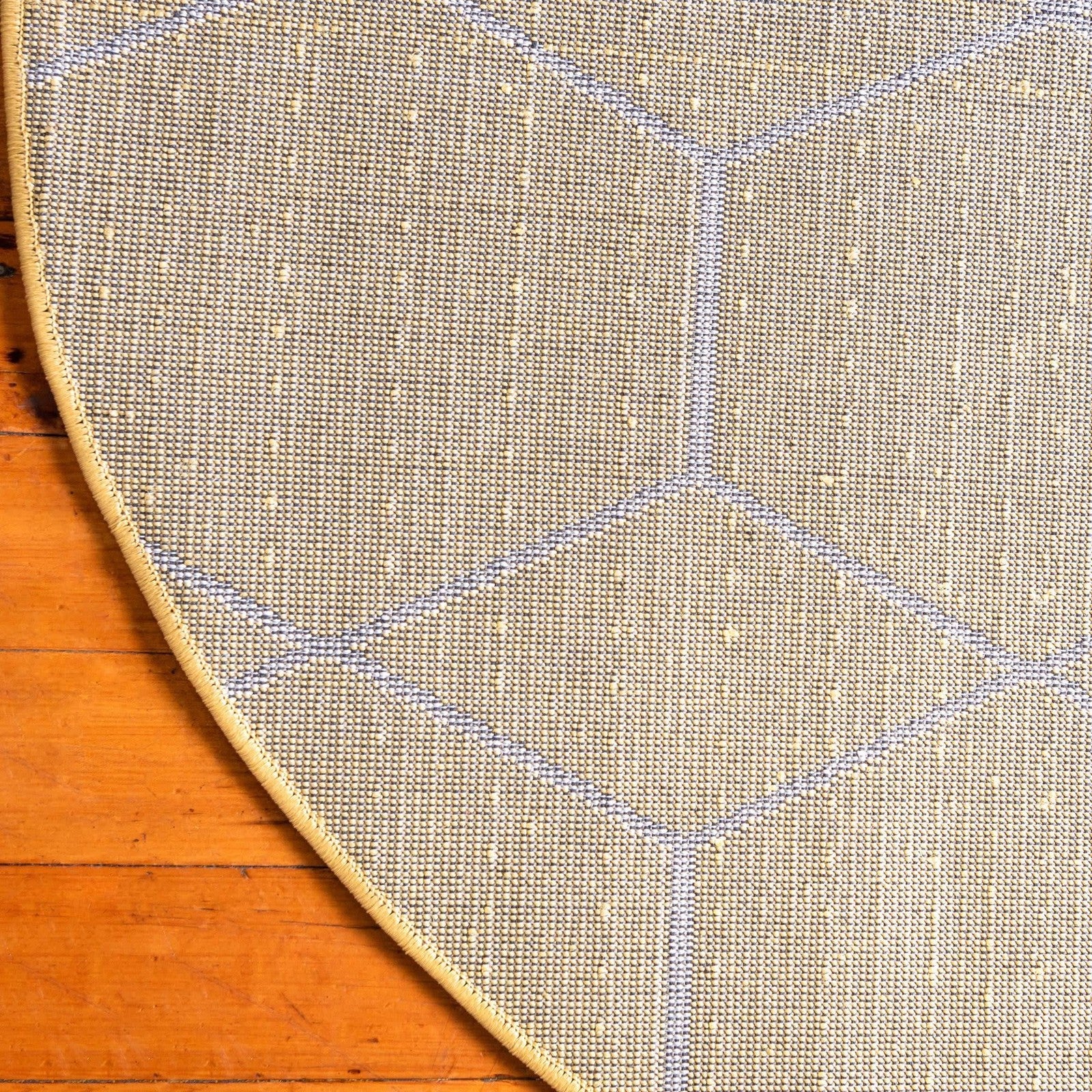 Unique Loom Trellis Frieze Collection area rug with a geometric yellow round design, showcasing a textured, modern style.