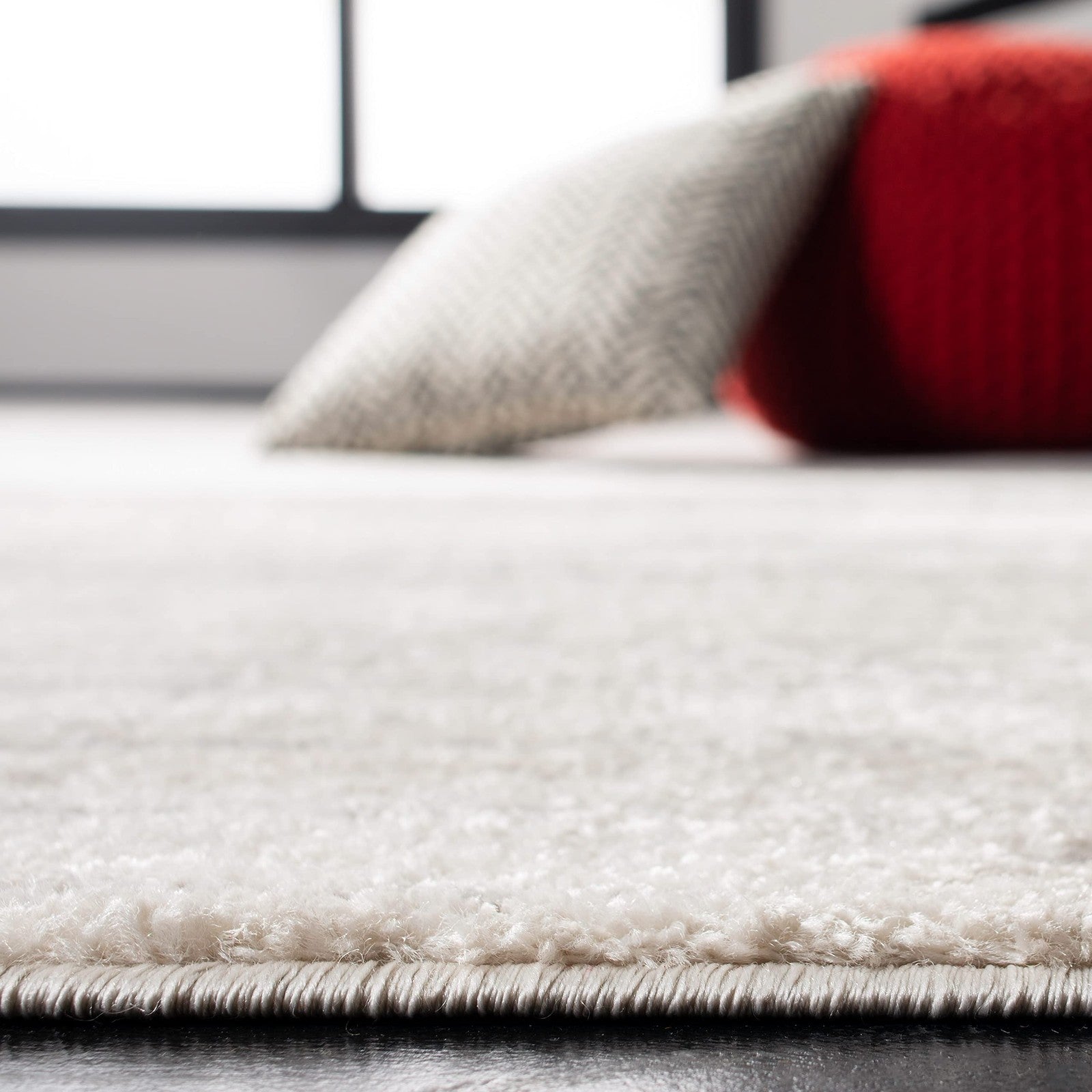 Safavieh Adirondack Collection ivory and silver modern ombre area rug with a square shape and elegant design.