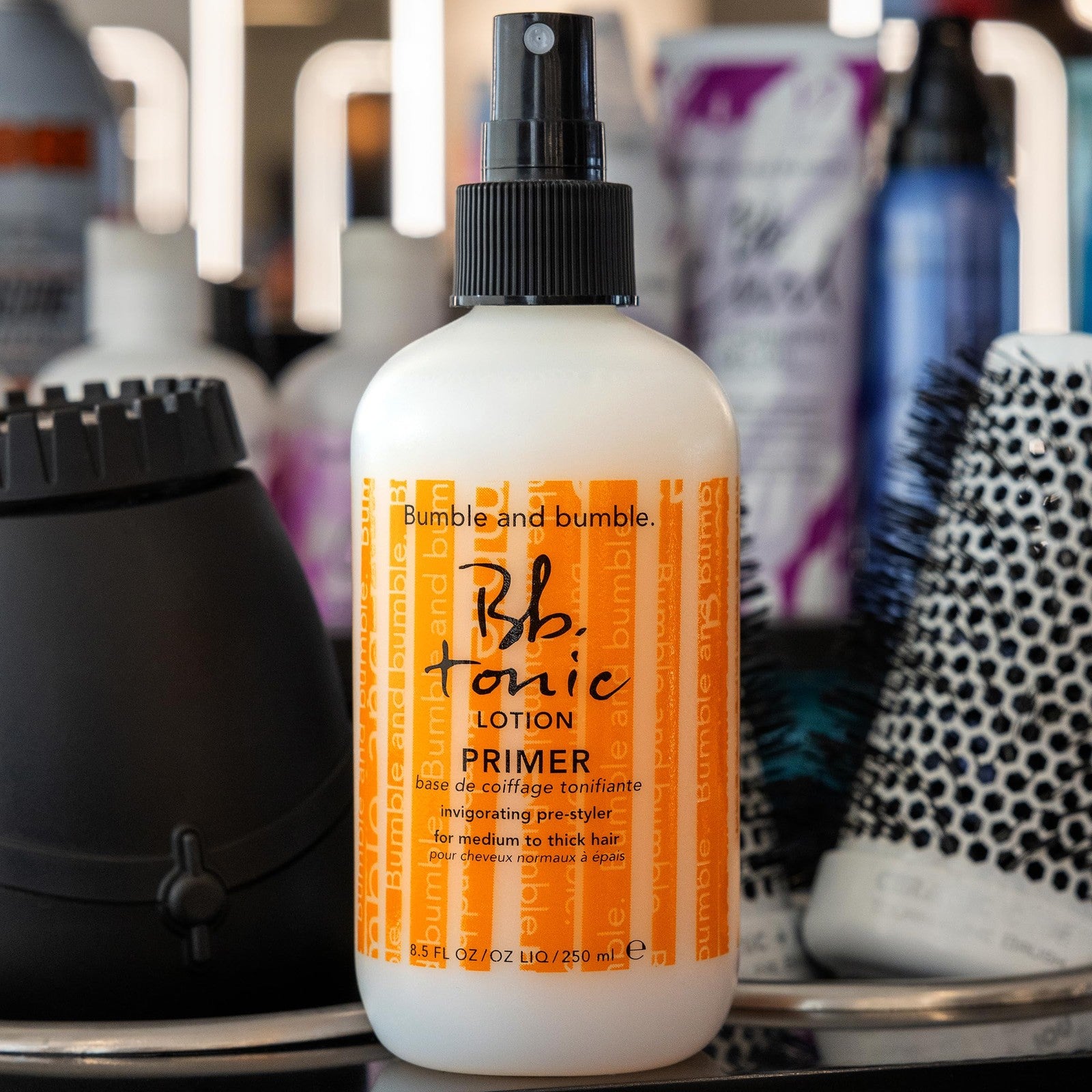 Bumble and bumble Tonic Lotion with tea tree oil for detangling, refreshing scalp, in an 8oz bottle with a pump dispenser.