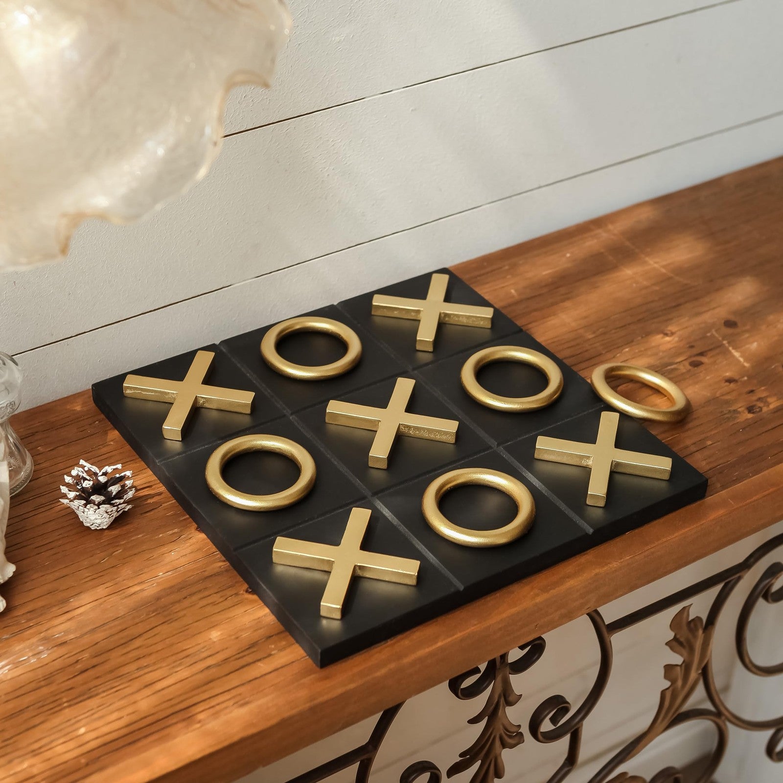 NIKKY HOME 12x12 tic tac toe wooden game board on coffee table, modern decor piece with grid and game pieces visible