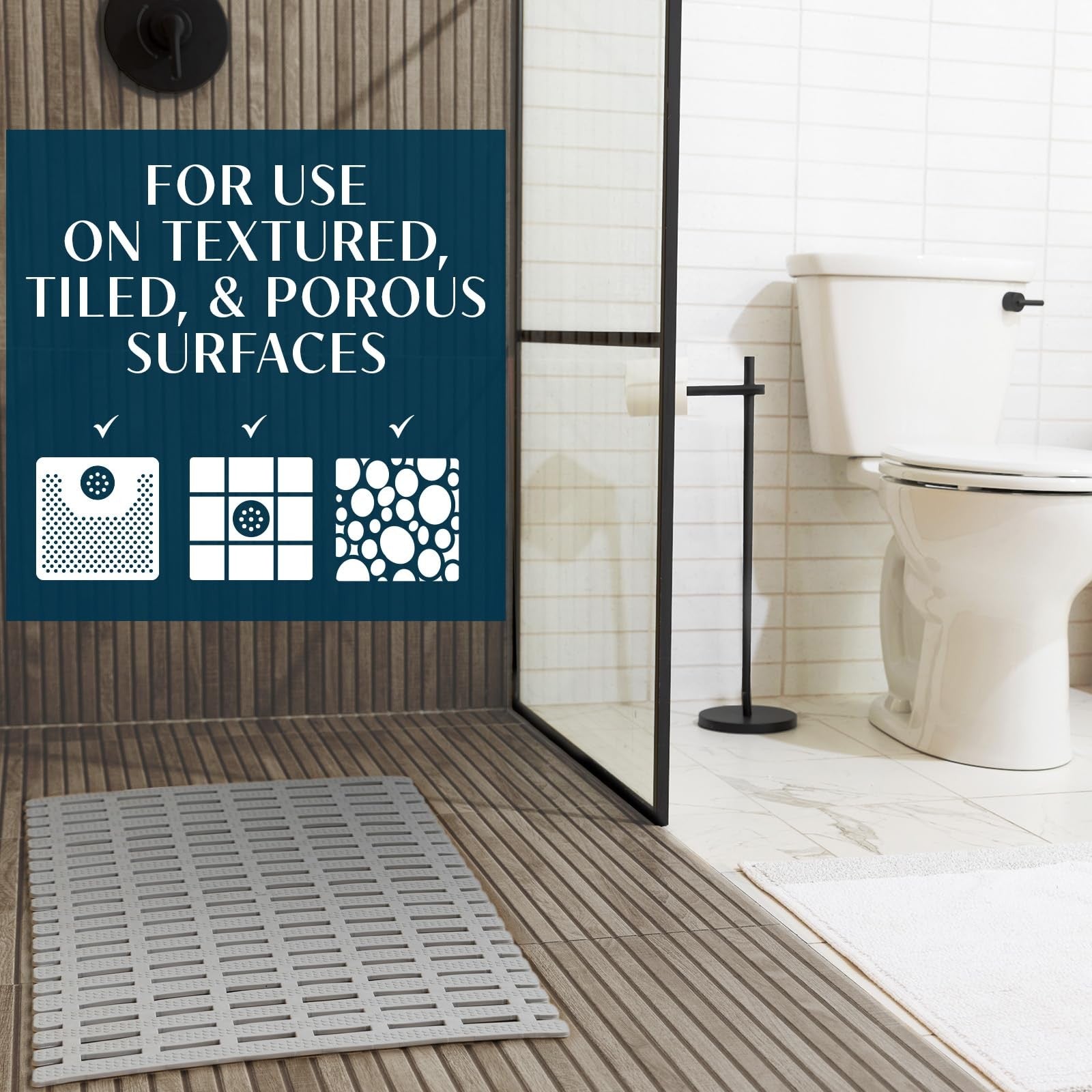 SlipX Solutions weighted non-slip bath mat with textured surface for tub and shower safety, shown in a bathroom setting.