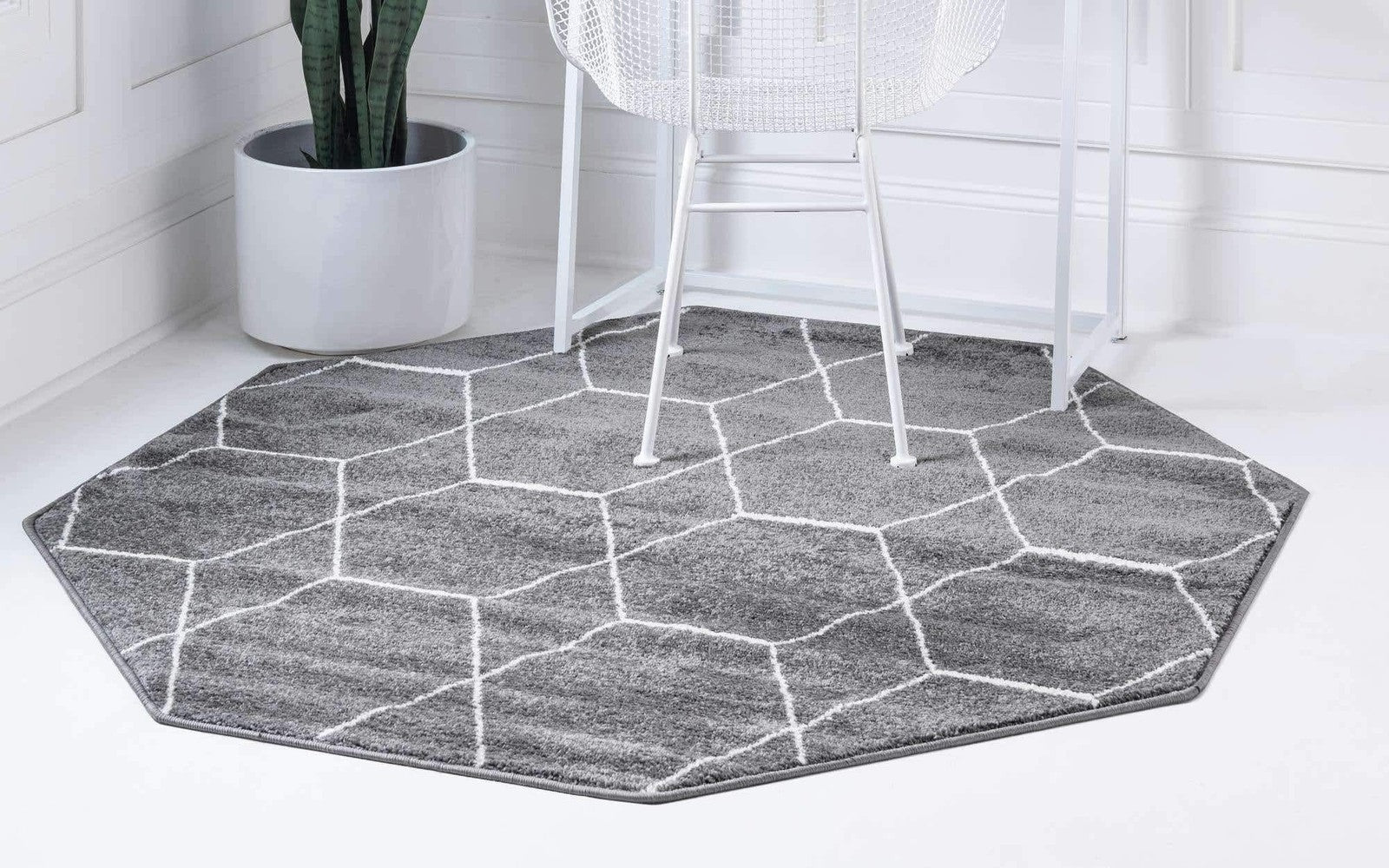 Dark gray Unique Loom Trellis Frieze geometric area rug with 5 octagon pattern, showcasing its textured design and modern style.