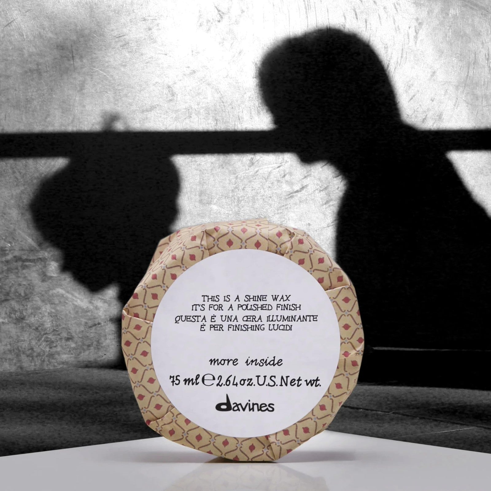 Davines This Is A Shine Wax with light hold and high shine, creamy texture, shown in 2.54 fl oz container.