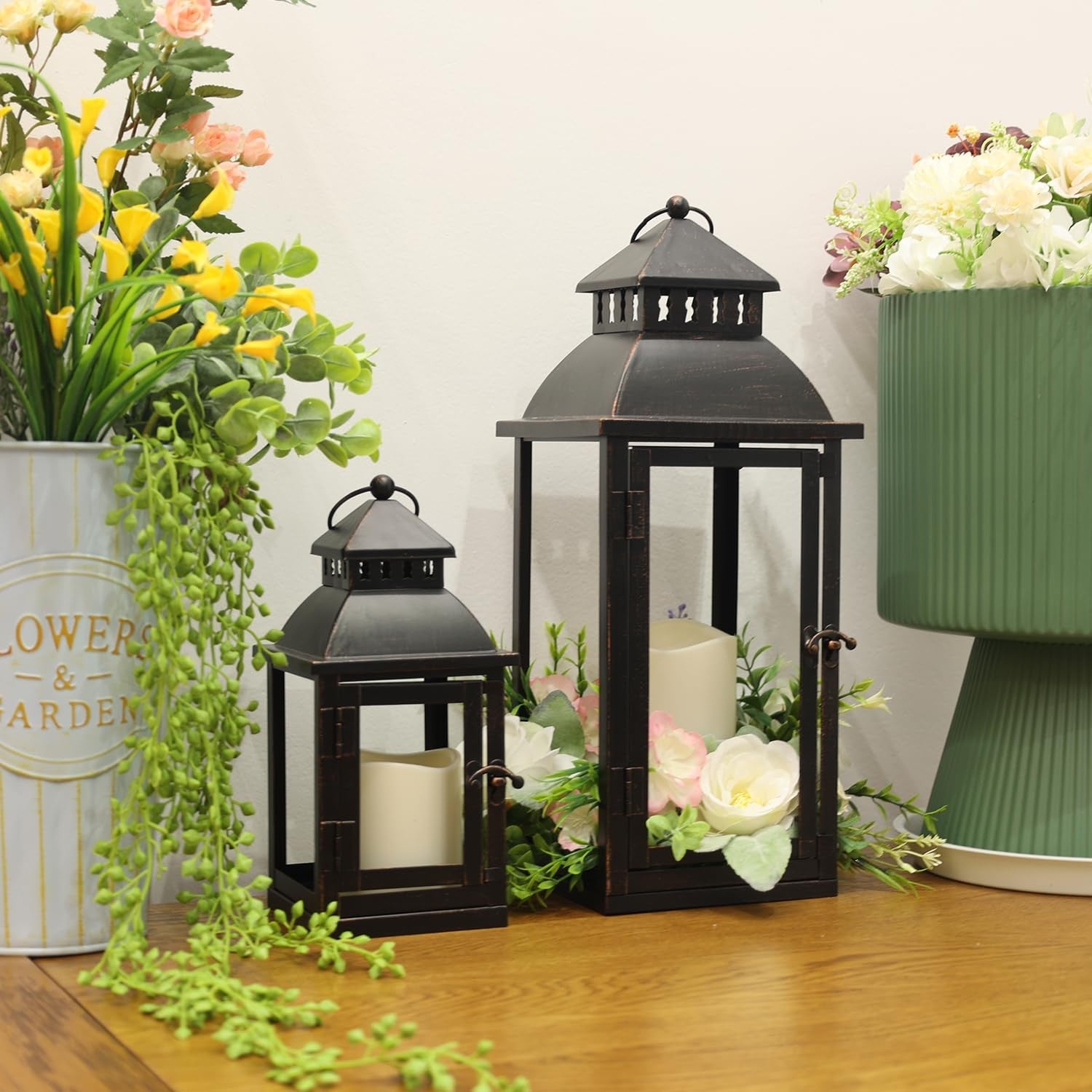 Needomo LED lanterns set of 2, large bronze metal decorative outdoor and indoor lanterns with warm lighting.