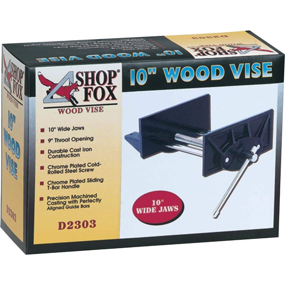 Shop Fox D2303 10-inch wood vise with metal screw and wooden jaws, mounted on workbench for woodworking projects.