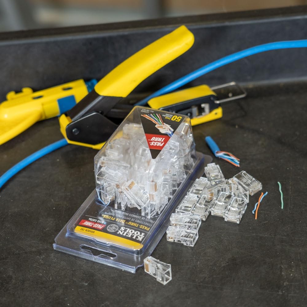 Klein Tools VDV826-702 Pass-Thru Modular Data Plug with RJ45 CAT5E Gold Connectors for Ethernet cabling.