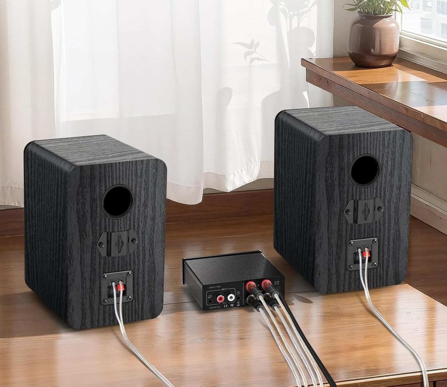Saiyin passive bookshelf speakers with 4Ω impedance, designed for desktop use, require an amplifier to operate, shown in the image.