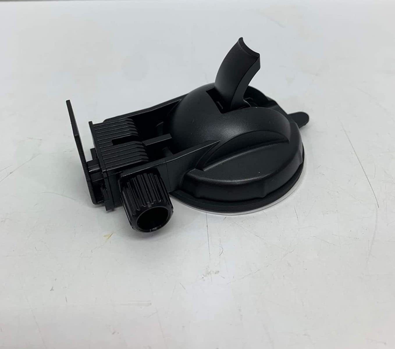 Uniden large premium suction cup mounting bracket for R8w, R8, R7, and R4w radar detectors, showing secure attachment on a surface.