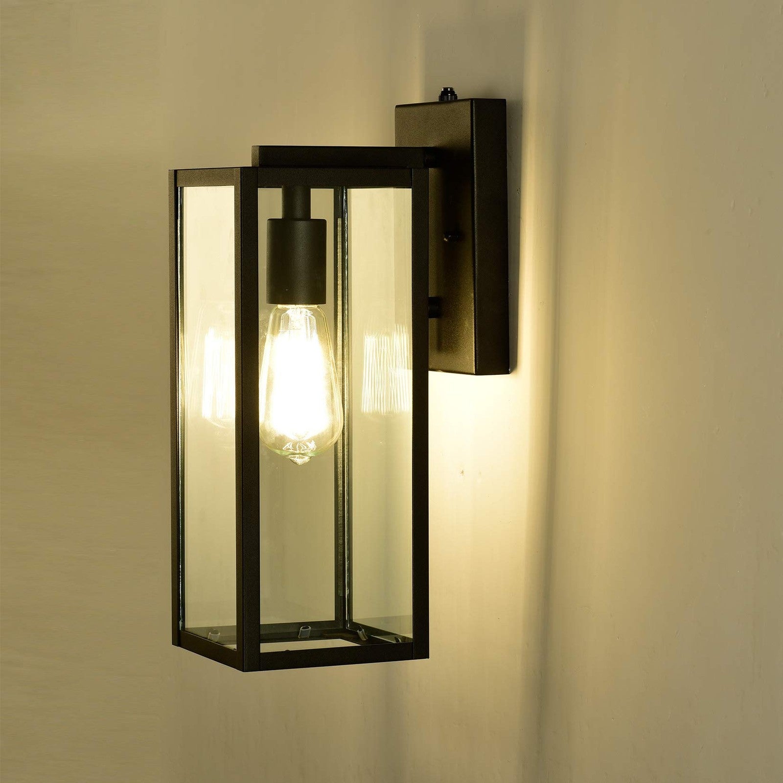 Dusk to Dawn outdoor wall lantern by Micsiu, 14.5-inch exterior wall mount lantern with classic design and metal finish.