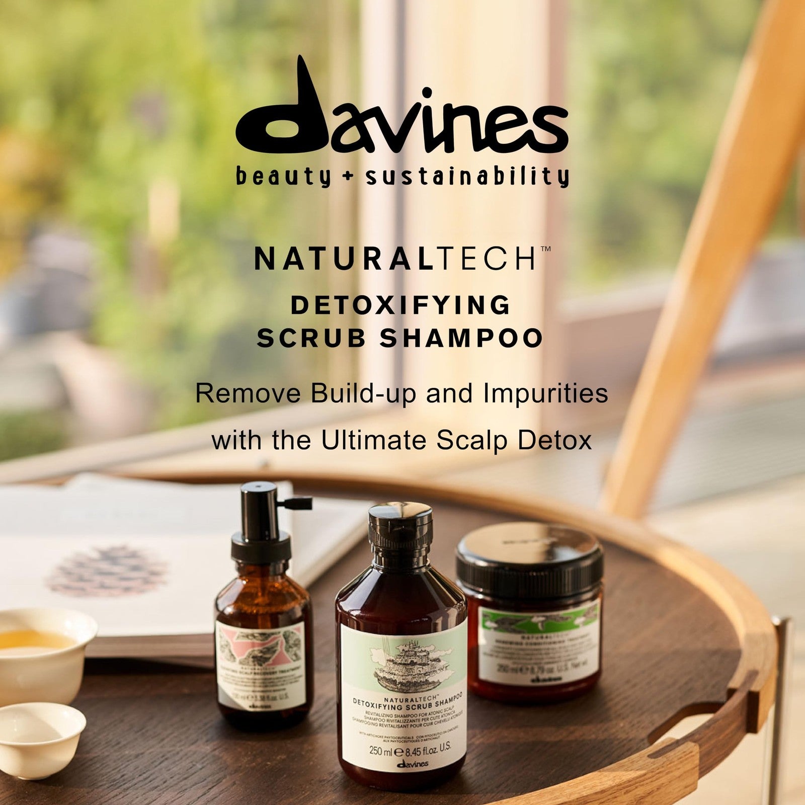 Davines Naturaltech Detoxifying Scrub Shampoo with natural ingredients, showing the bottle and textured scrub for deep hair cleansing.