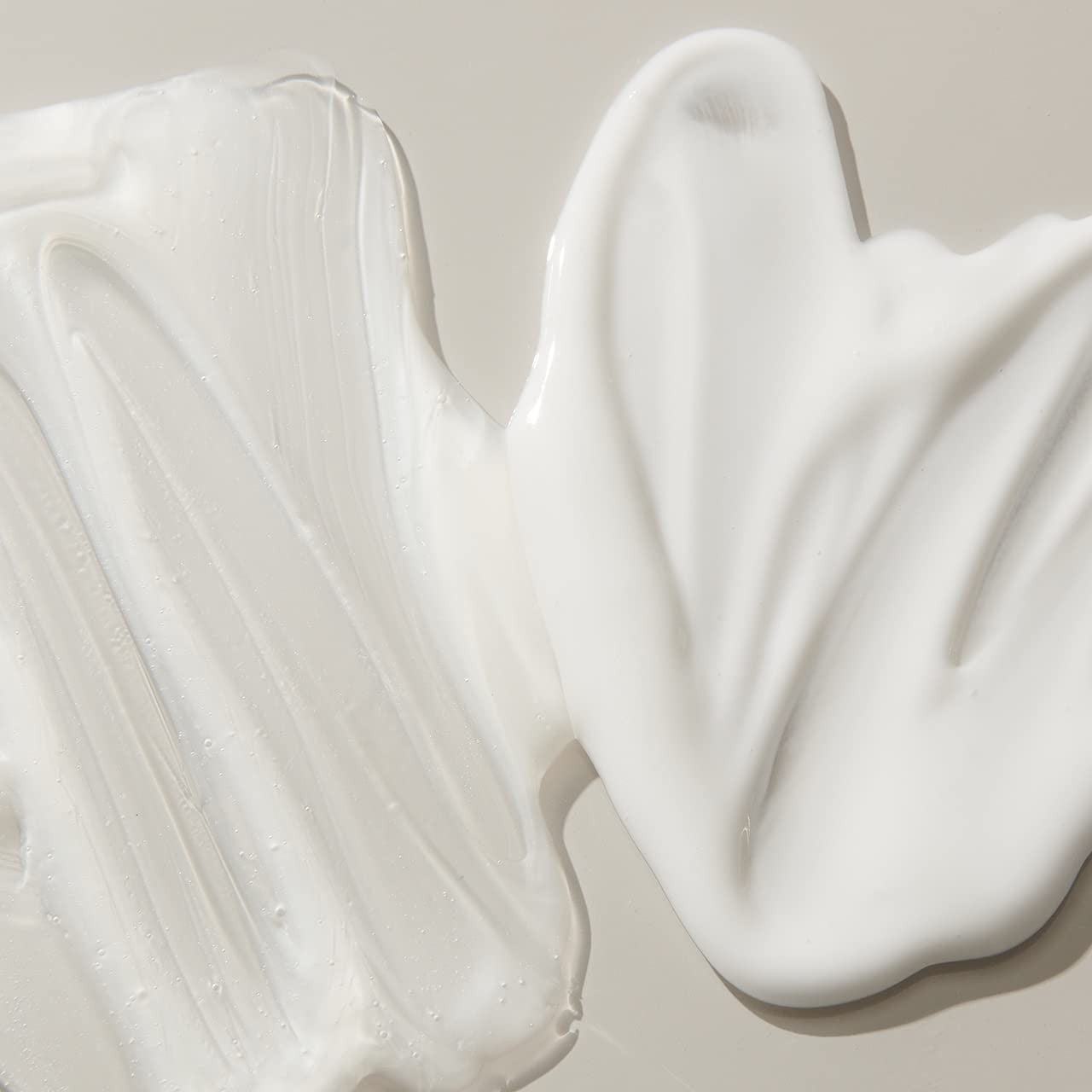 UNITE BOOSTA Conditioner bottle, volumizing and hydrating conditioner for fine hair, with a sleek design and clear labeling.