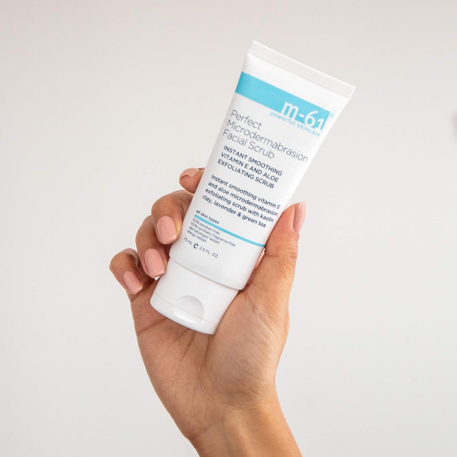 m-61 Perfect Microdermabrasion Facial Scrub jar showing exfoliating and smoothing texture for instant skin renewal.