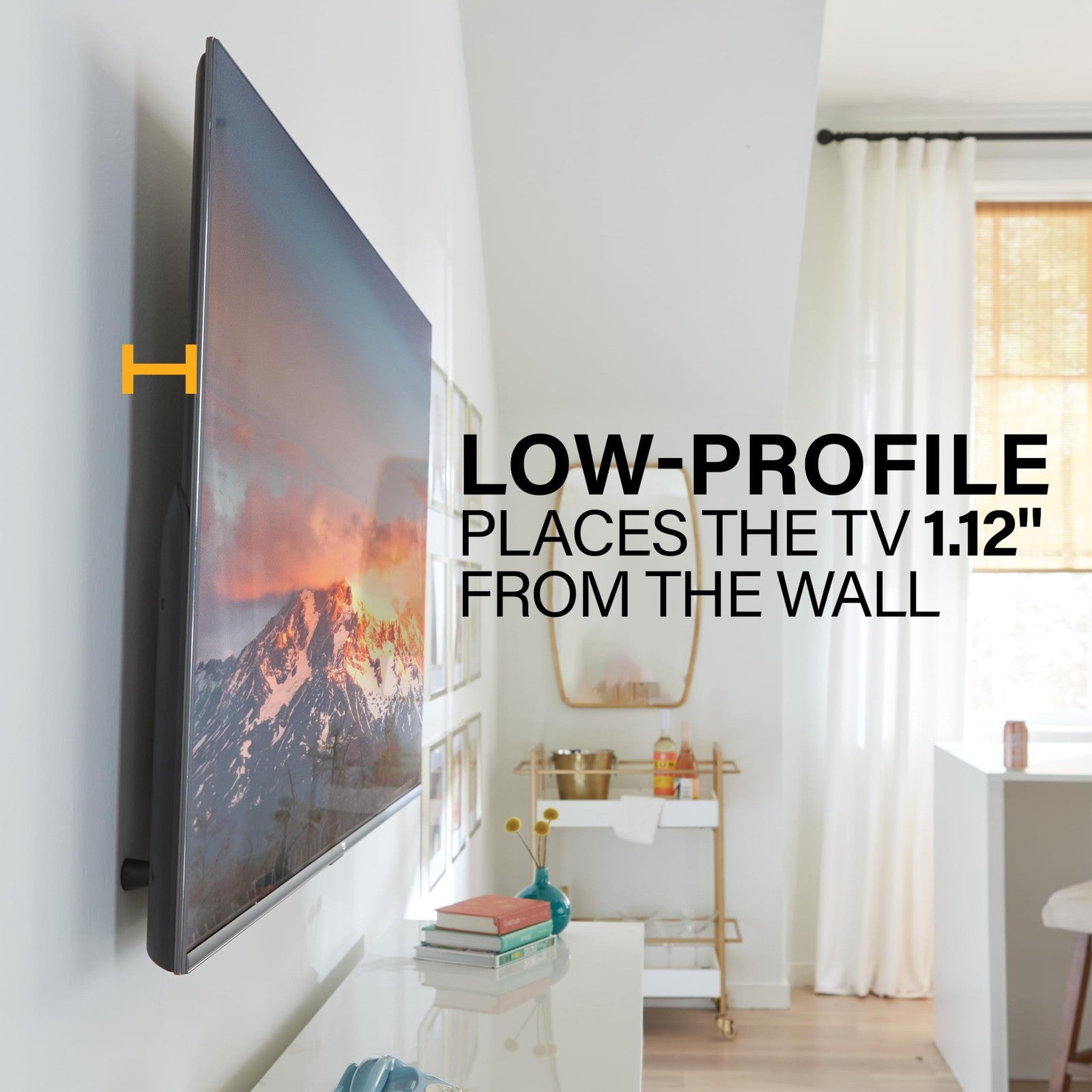 Sanus No Drill No Stud TV wall mount for 32-85 inch TVs, showing the mount attached securely to a modern living room wall