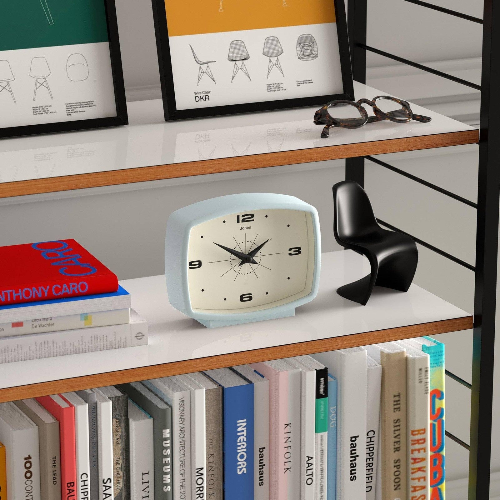 Jones Clocks Film Desk Clock with retro rectangular design in pale blue, showcasing a vintage-inspired style and classic clock face.