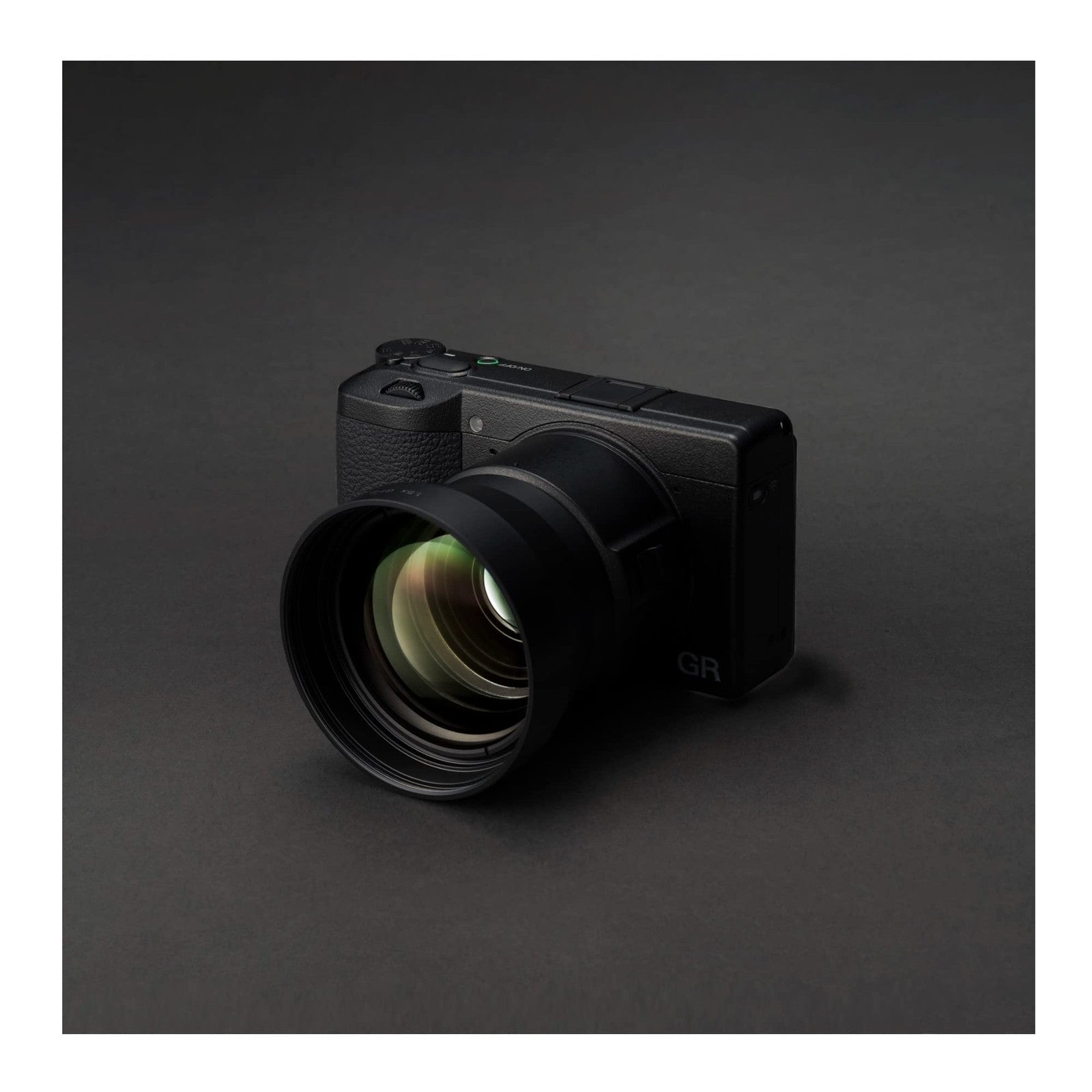 Ricoh GA-2 lens adapter for Ricoh GR IIIx camera, used with tele-conversion lens, shown on a white background.