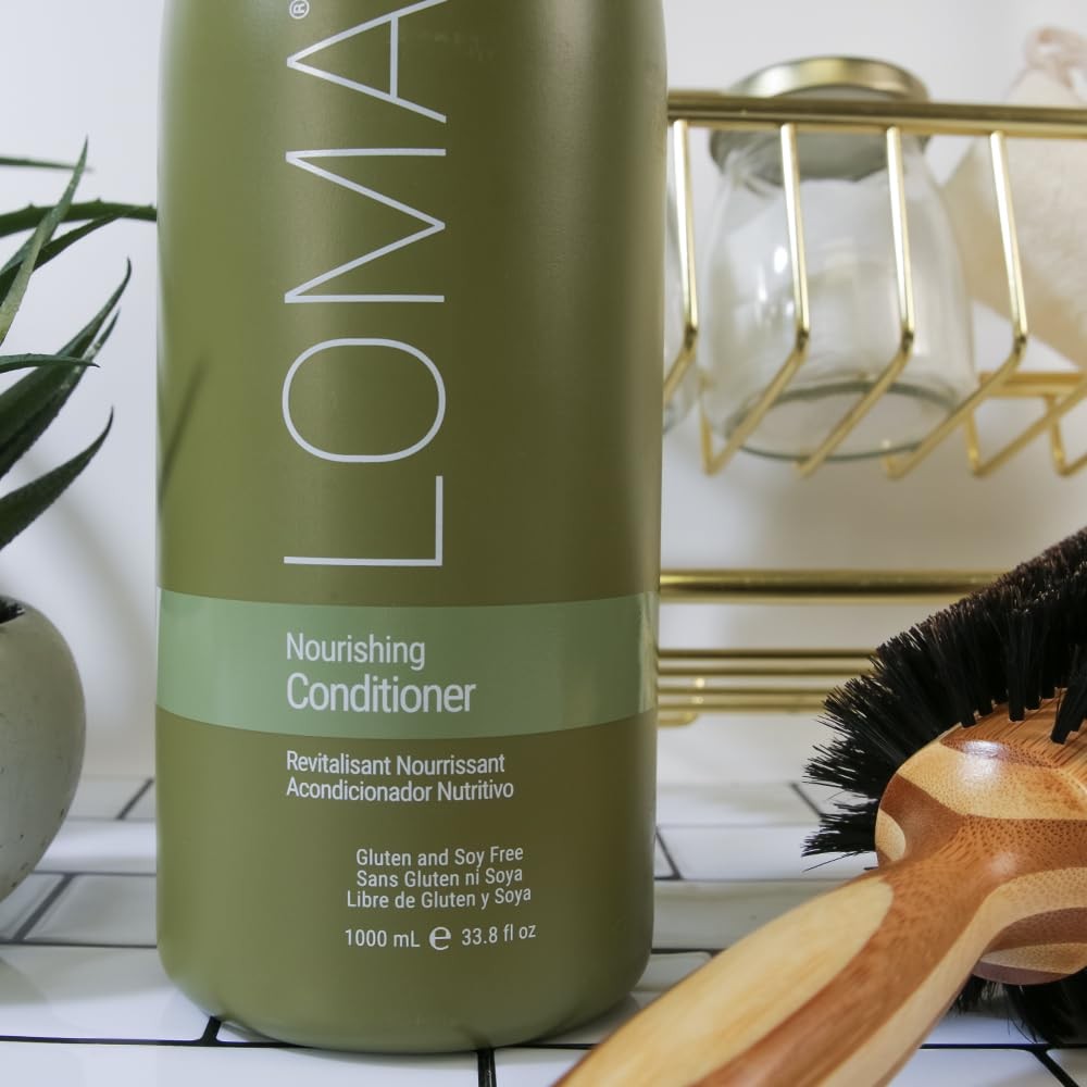 Loma Nourishing Conditioner in 33 oz bottle, repairing dry and damaged hair with a rich, nourishing formula.