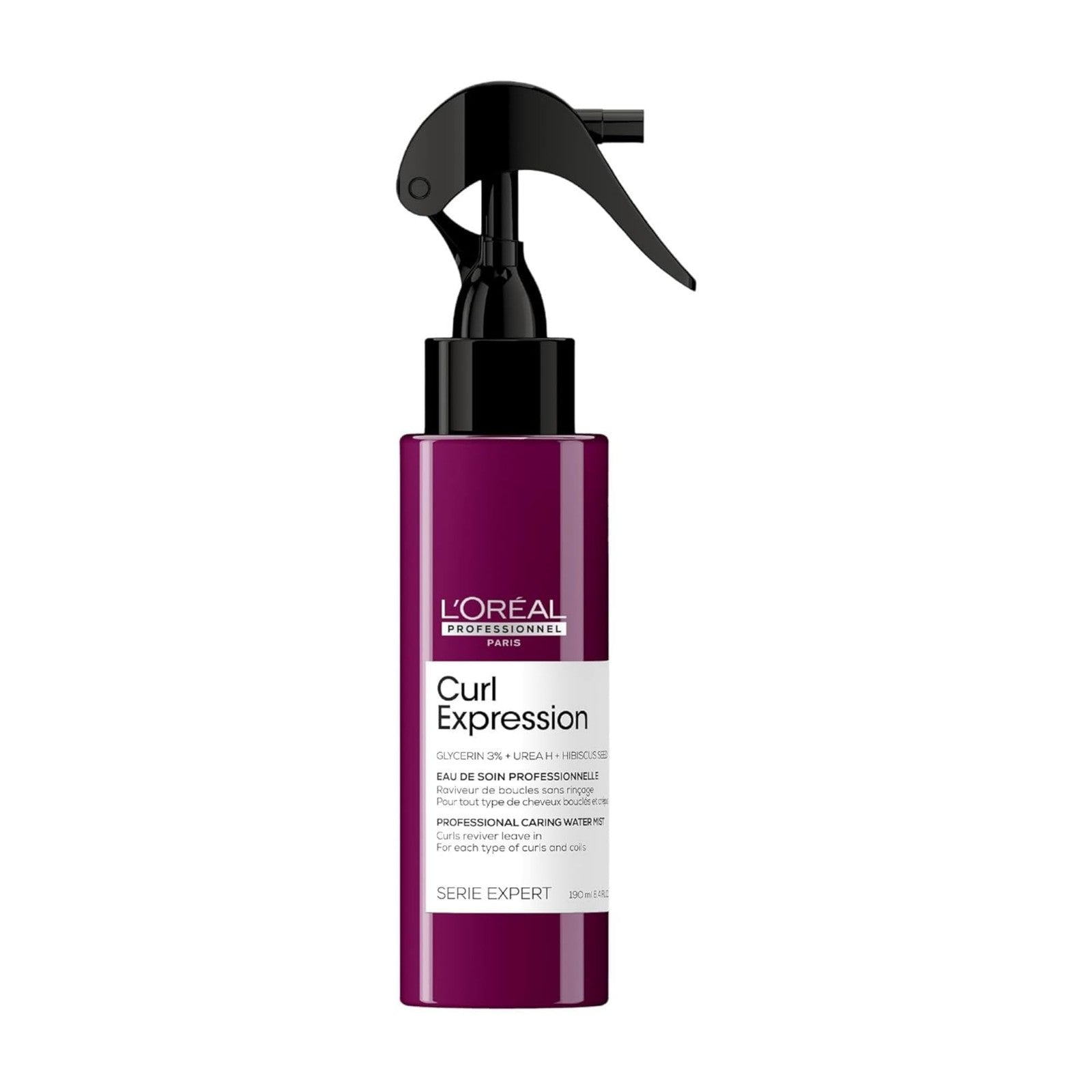 L'Oréal Professionnel Paris Curls Reviver spray for curly and coily hair, showing the product bottle with a curly-haired model in the background.