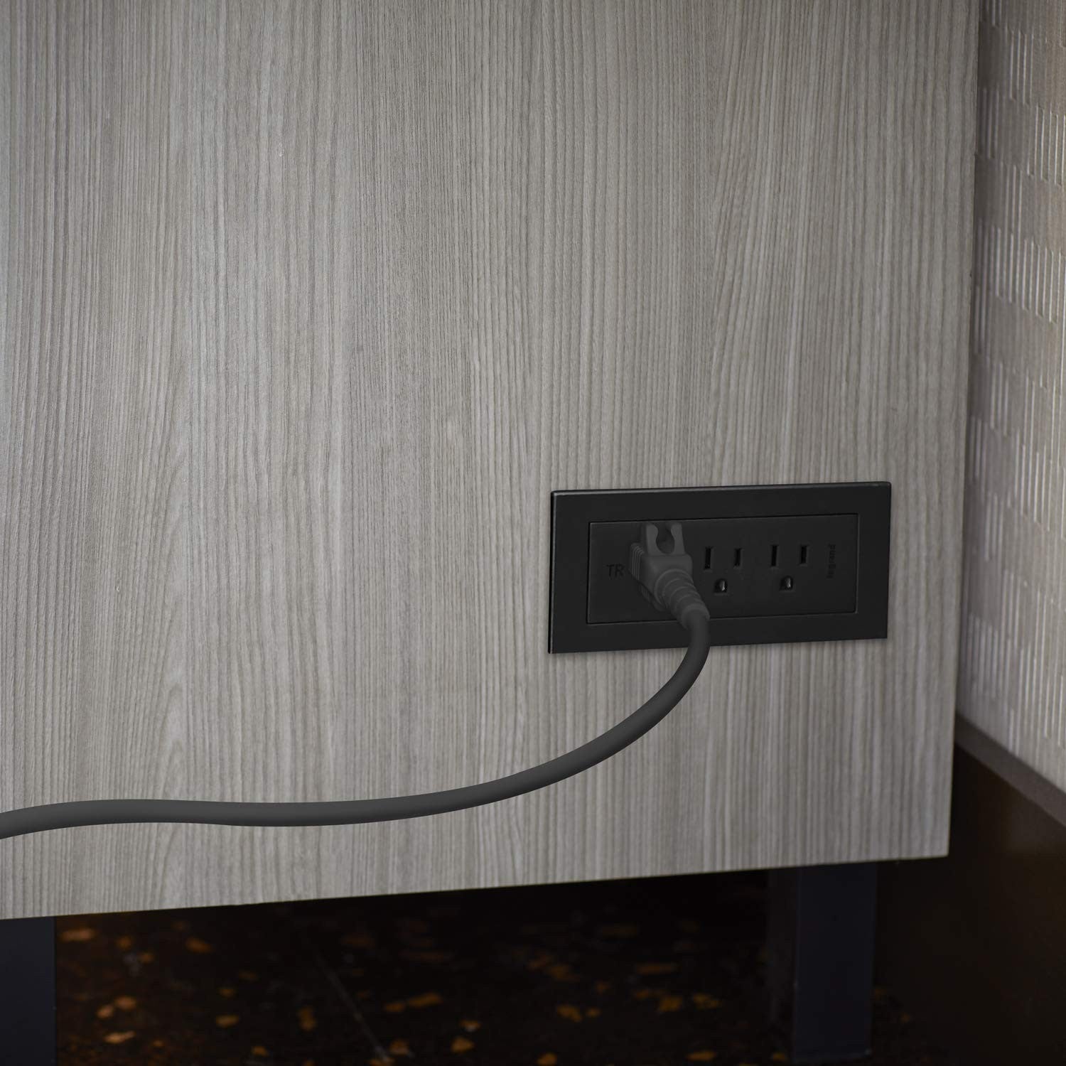 Wiremold Radiant Recessed Furniture Power Center Strip with multiple outlets and sleek black finish for office or home use.