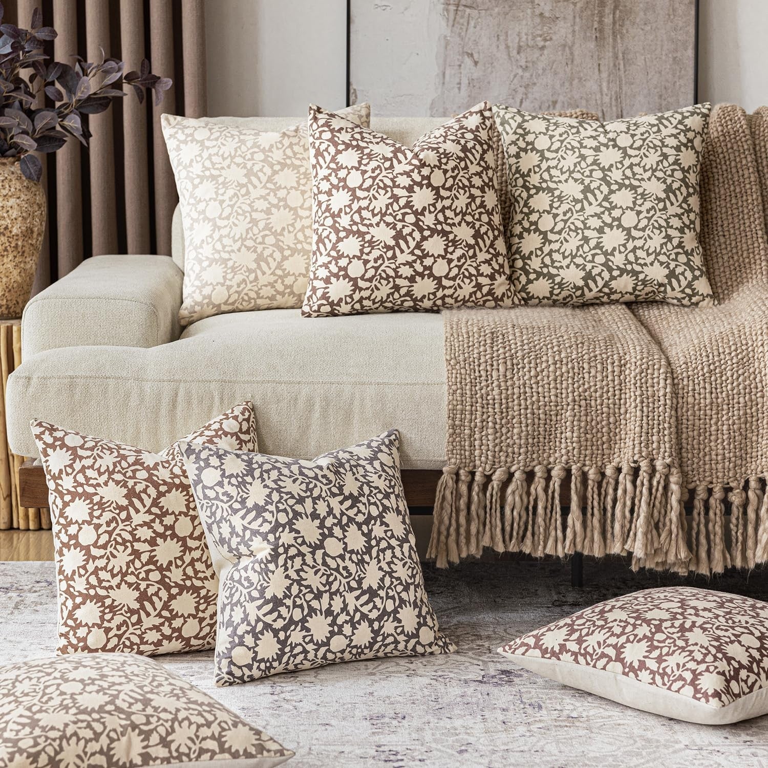 Foindtower set of 2 decorative floral throw pillow covers with neutral farmhouse-style design on soft fabric.