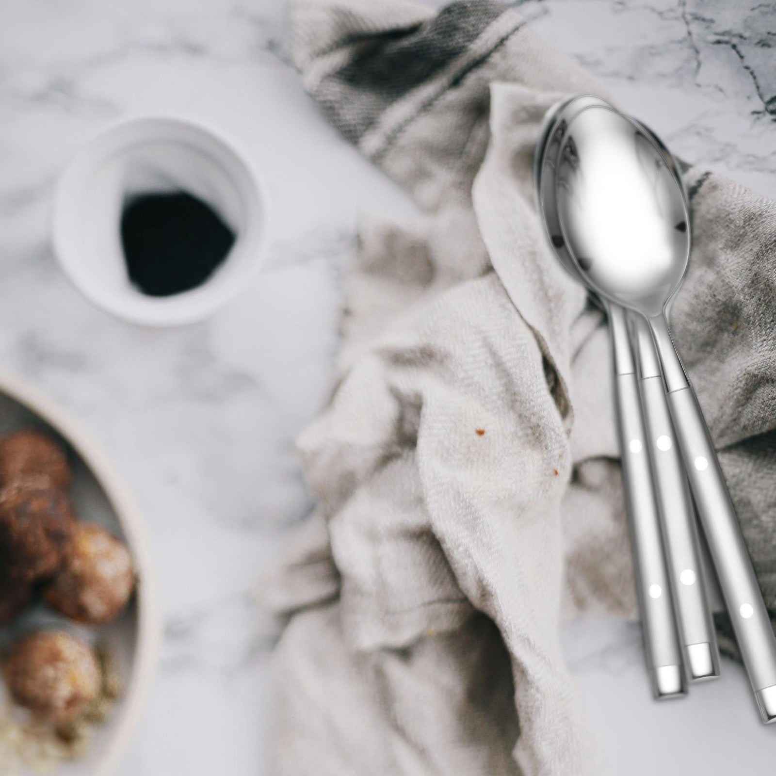 Hampton Forge Hampton Signature Shangrila 20-piece flatware set for four, including forks, knives, spoons, and teaspoons.