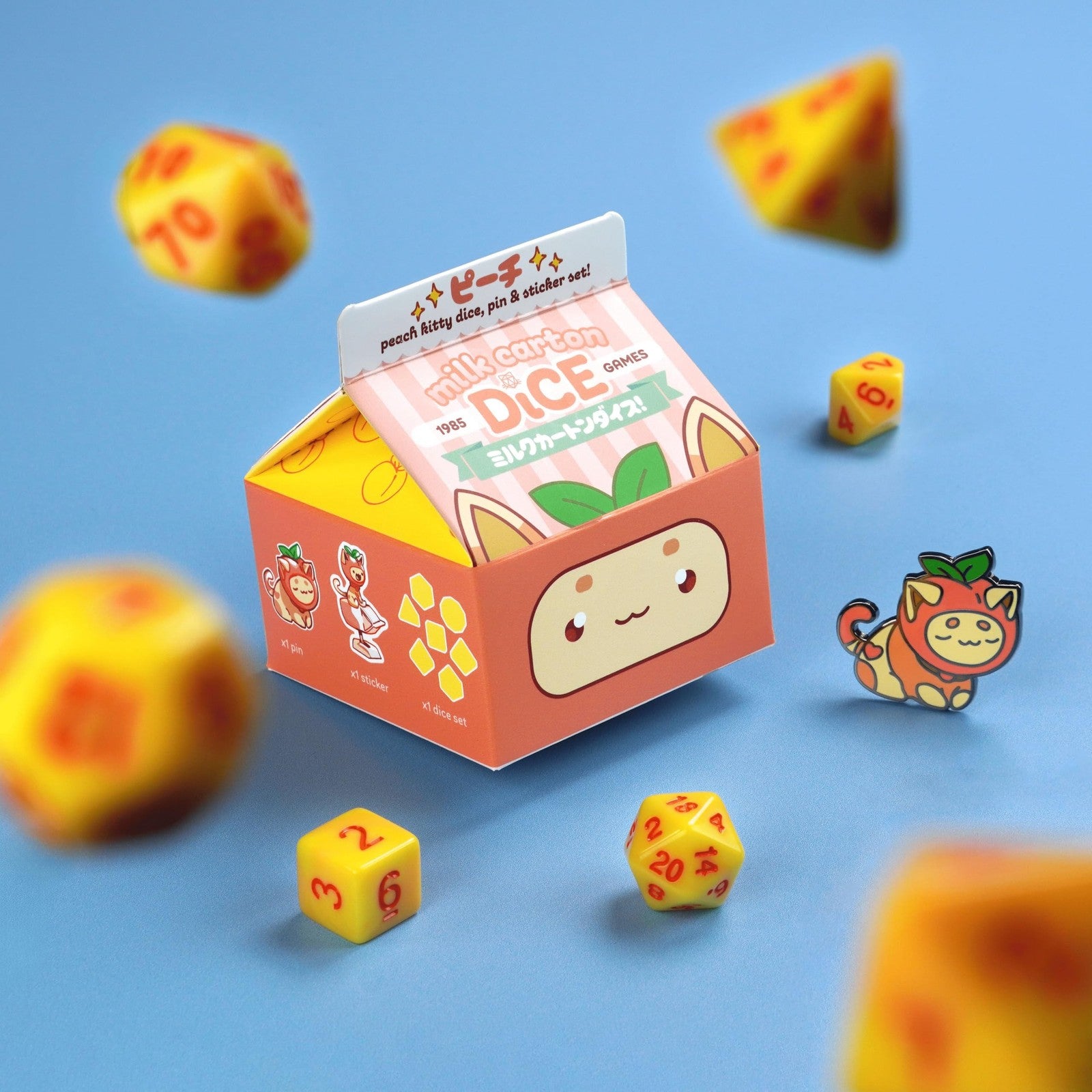 1985 Games Peach Cat Milk Carton dice set featuring DND-inspired dice in a playful milk carton design.