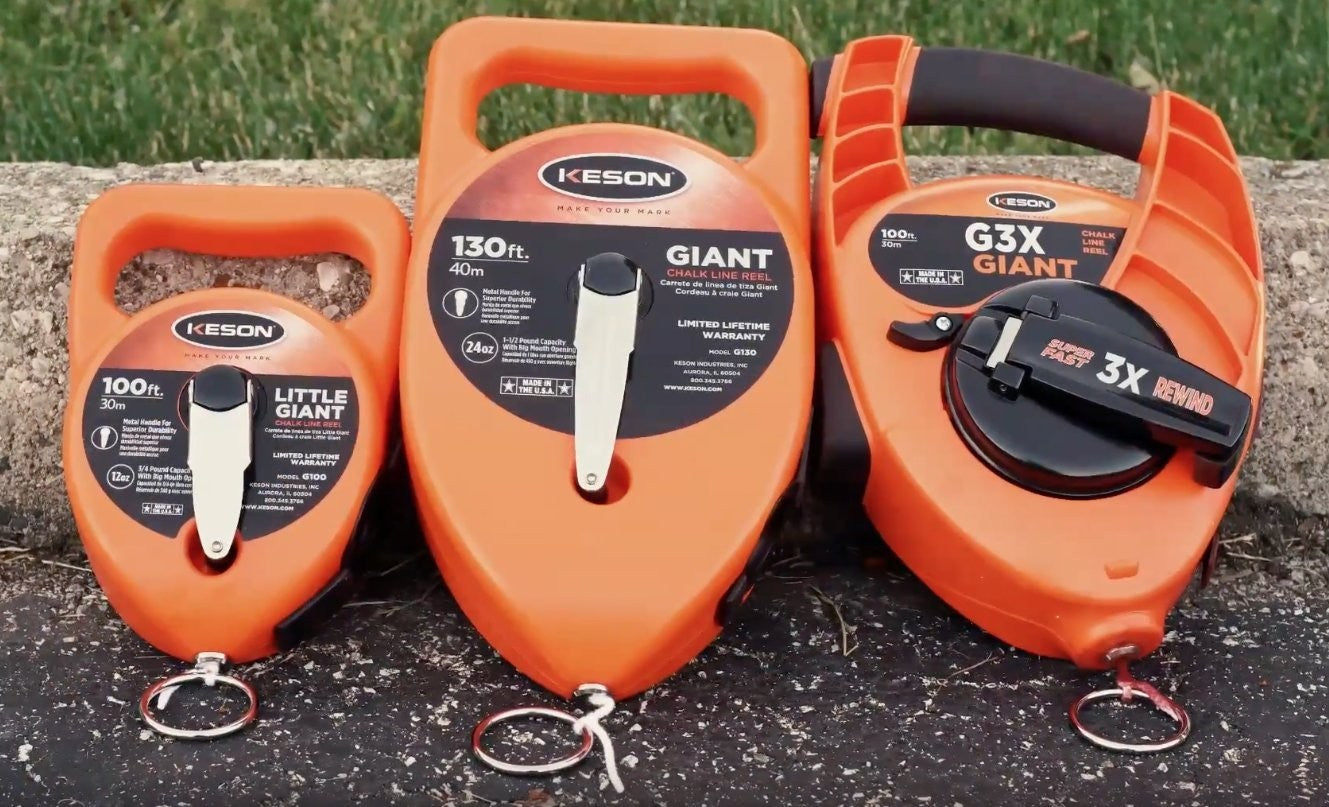 Keson G130 giant chalk line reel with 130ft length and 24oz chalk capacity, shown with black and yellow design.