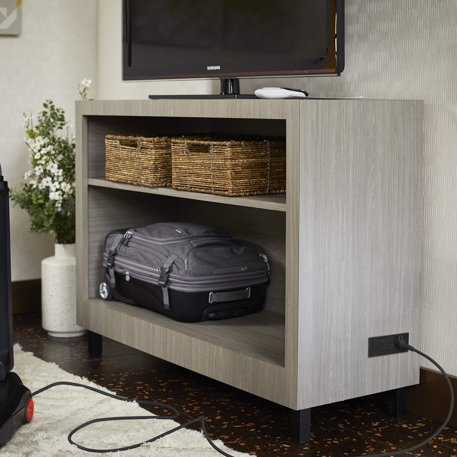 Wiremold Radiant Recessed Furniture Power Center Strip with multiple outlets and sleek black finish, designed for office or home use.