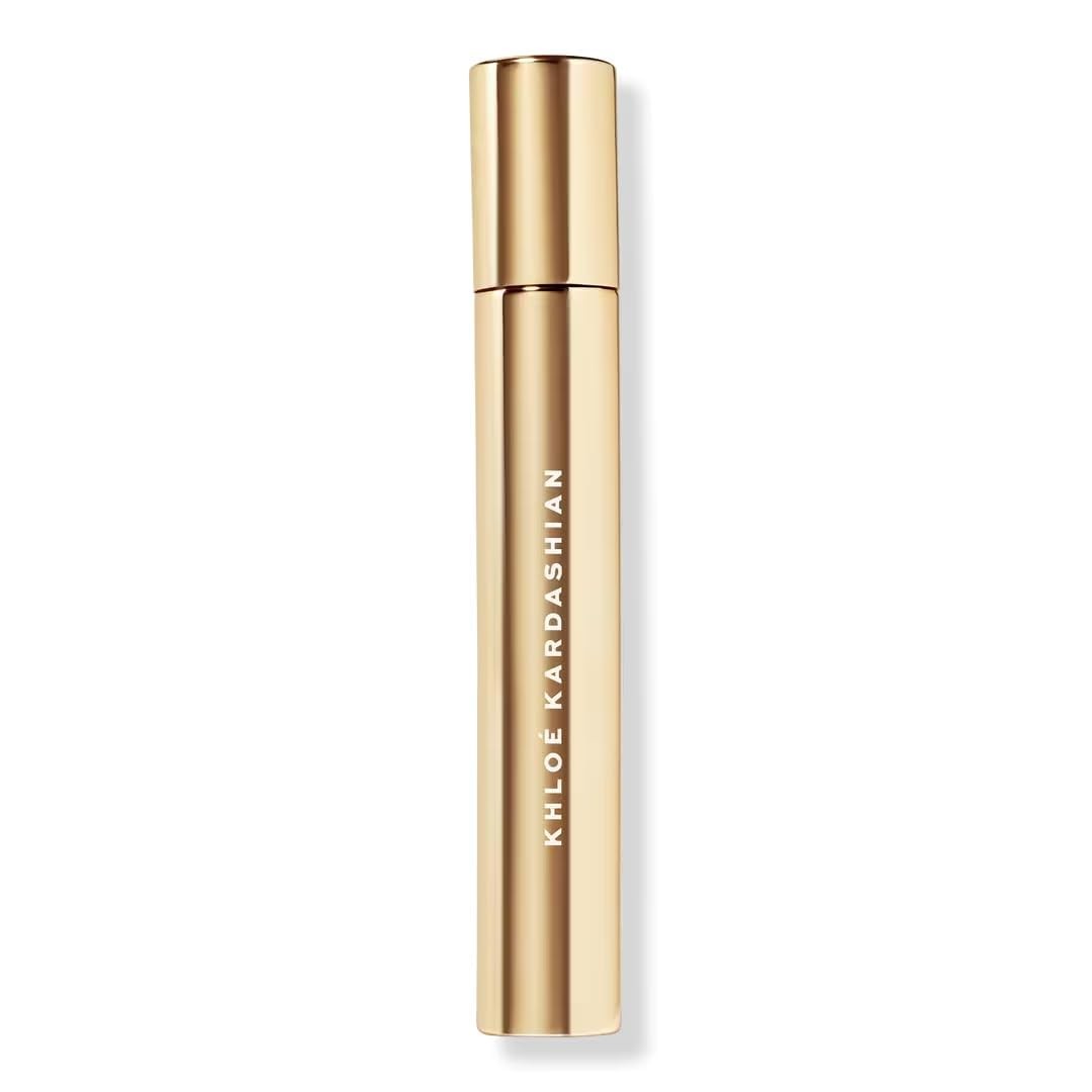 Generic XO KHLOE EdP travel spray bottle with floral woody fragrance, 0.33 fl oz (10 ml).